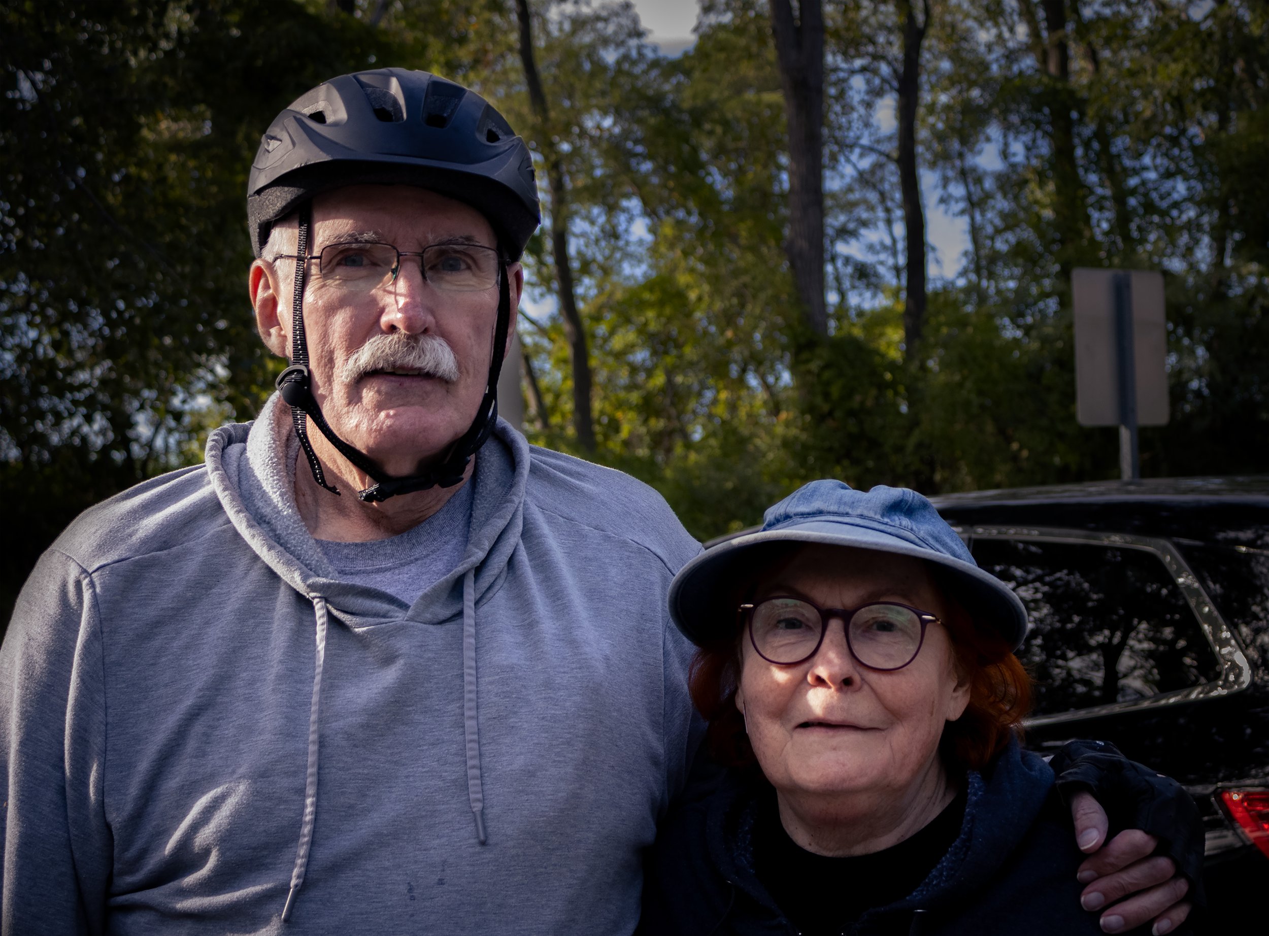 “Biking Beloved’s “
This husband and wife were packing up their bikes just before I photographed them. They told me that when the weather is good, they try and go on a bike ride around Presque Isle together at least once a week.