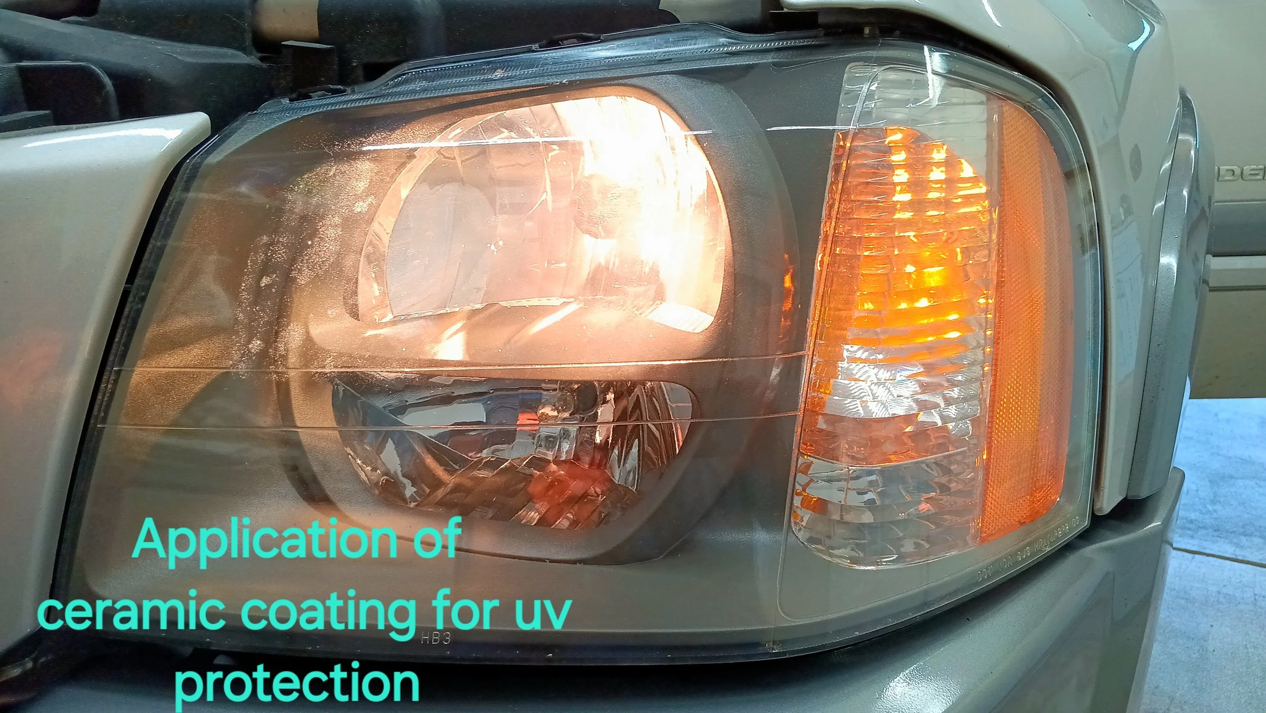Close-up of a vehicle's front headlight with a transparent protective coating being applied, indicated by the text: "Application of ceramic coating for UV protection."