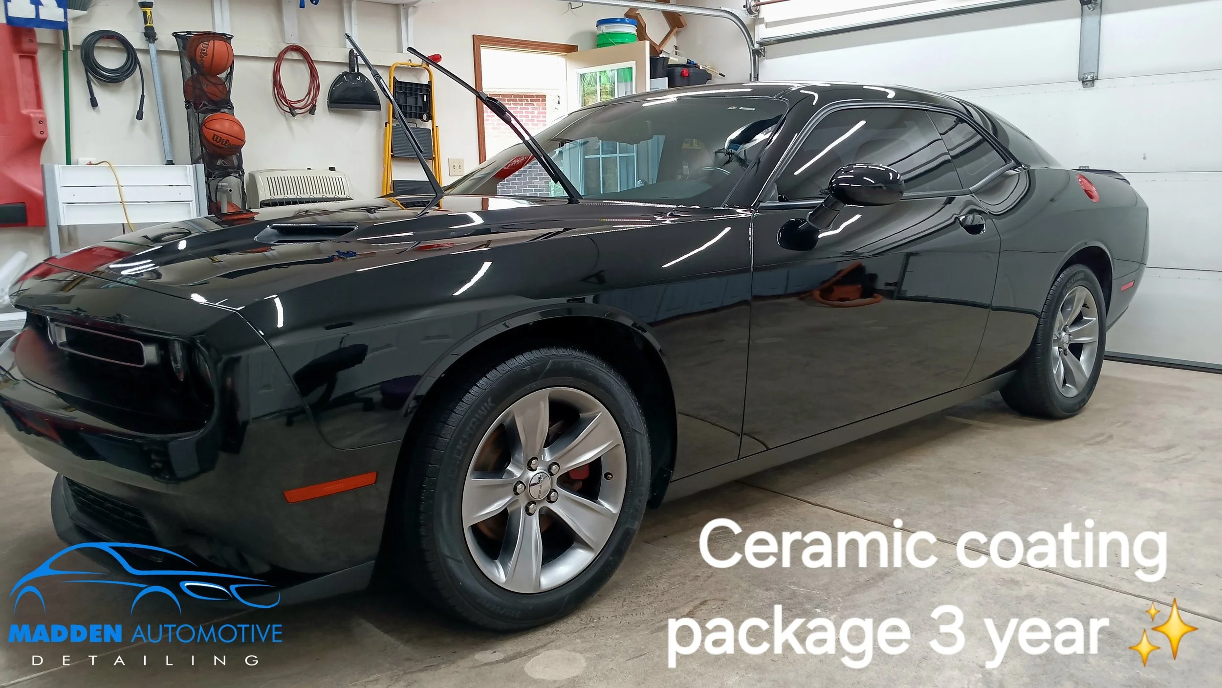 Black Chevrolet Camaro in garage with text overlay promoting ceramic coating package with 3-year warranty from Madden Automotive Detailing.