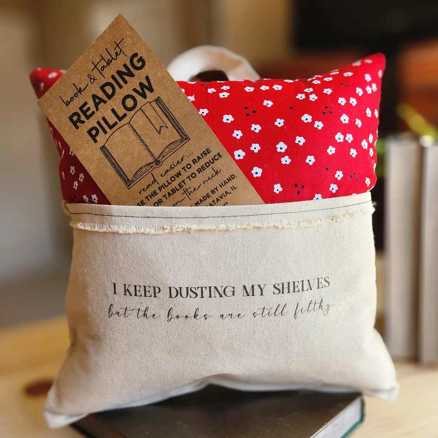 I Keep Dusting..., Reading Pillow, Red with White Flower 1.png