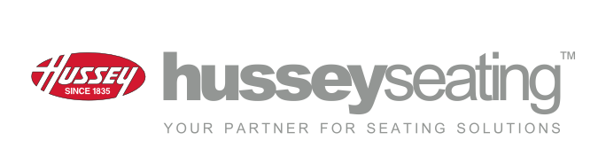 Red Hussey Seating logo with white font on left and with gray tag line "Your Partner for Seating Solutions" on the right