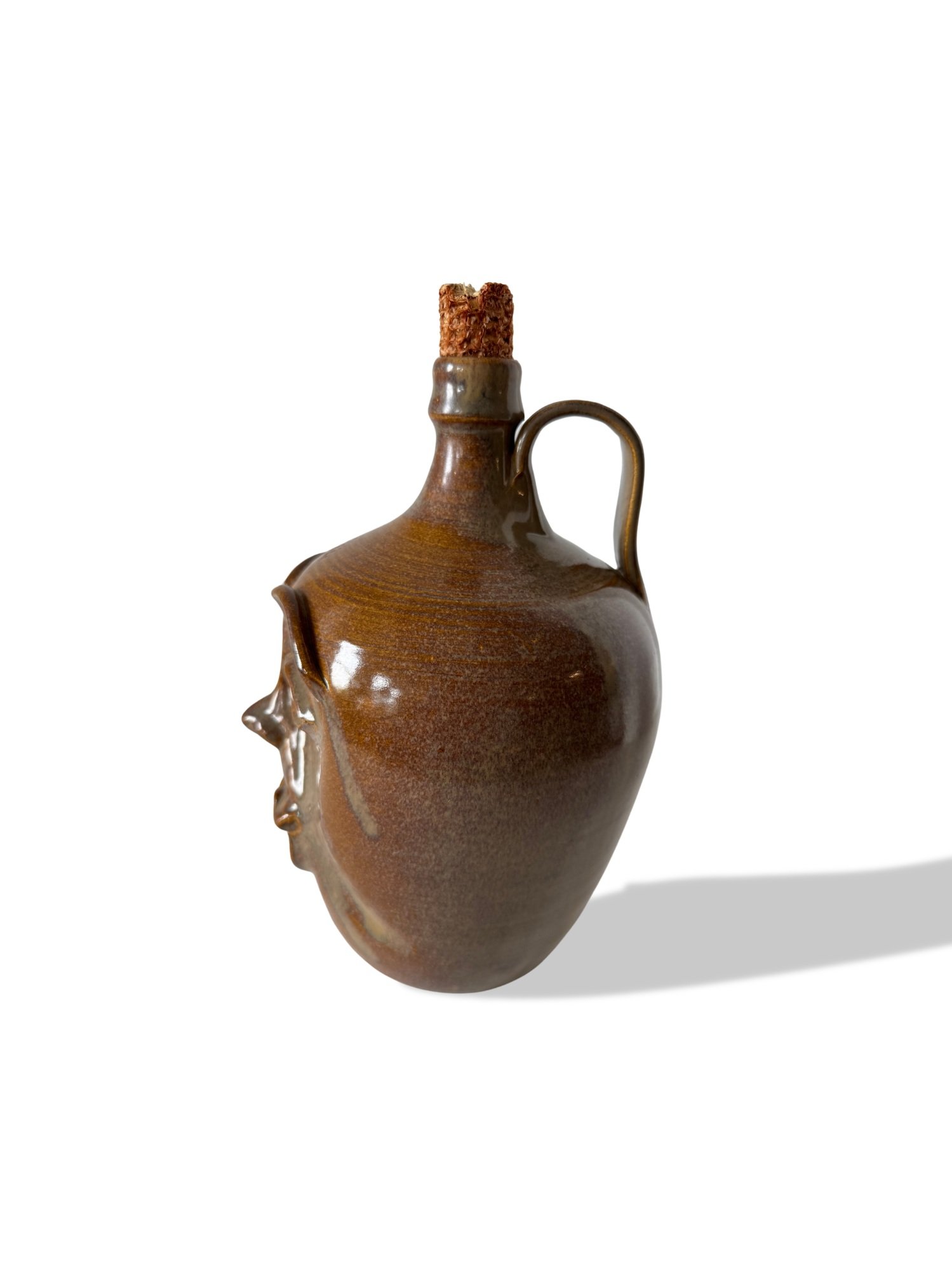 Signed folk art ceramic jug by J. Daves, dated May ’93. Ugly jug style with exaggerated eyes and teeth. Sculptural and expressive. Available at Studio TMS Chicago.