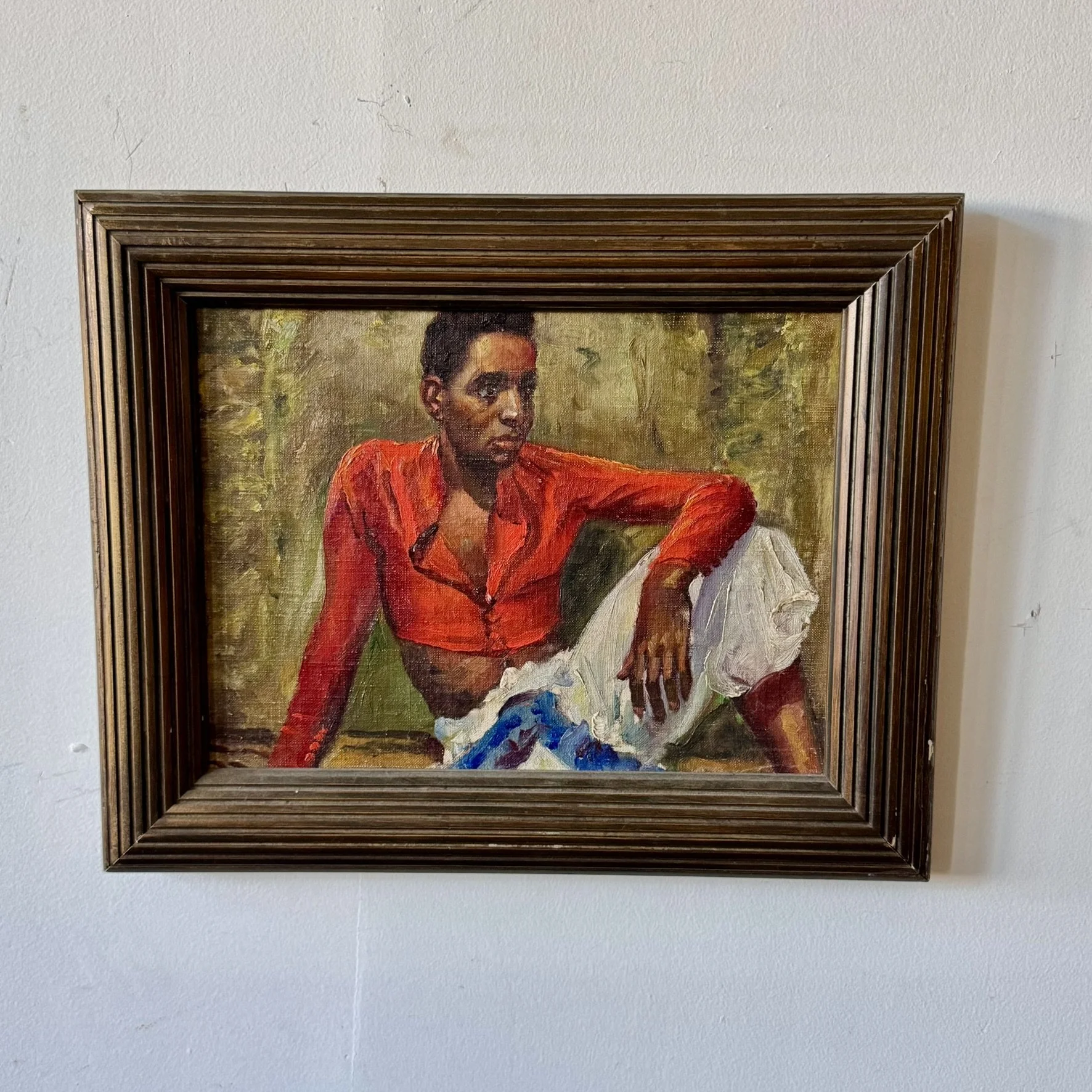 Portrait of a young boy seated Artist unknown