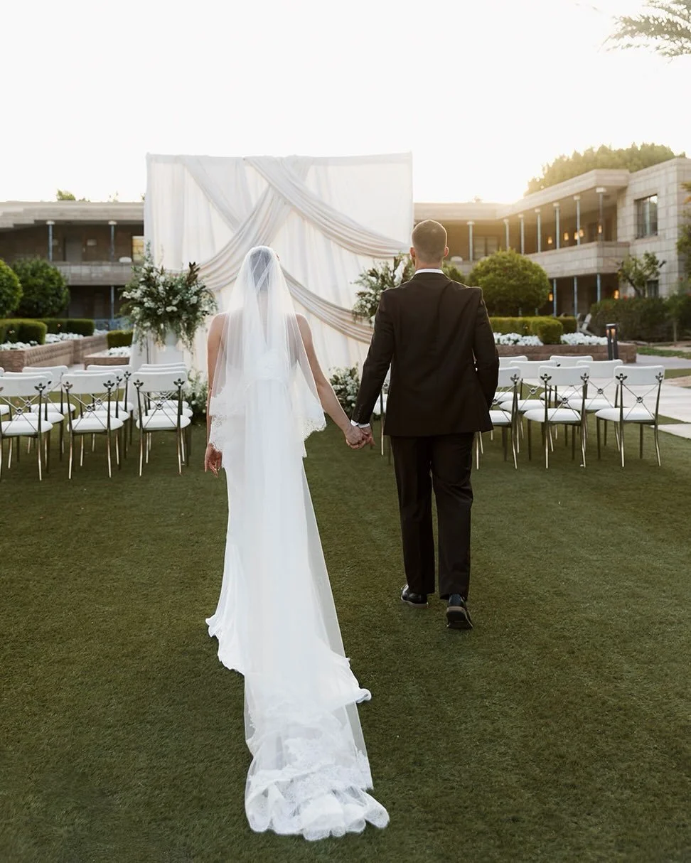 Soft draping creates a ceremony backdrop that feels romantic, timeless, and effortlessly beautiful. 🤍

Draping: @divinityeventproductions 
Photo: @karliecolleenphotography 
Floral: @kellyottmartin18 
Rentals: @hazelgroverentals