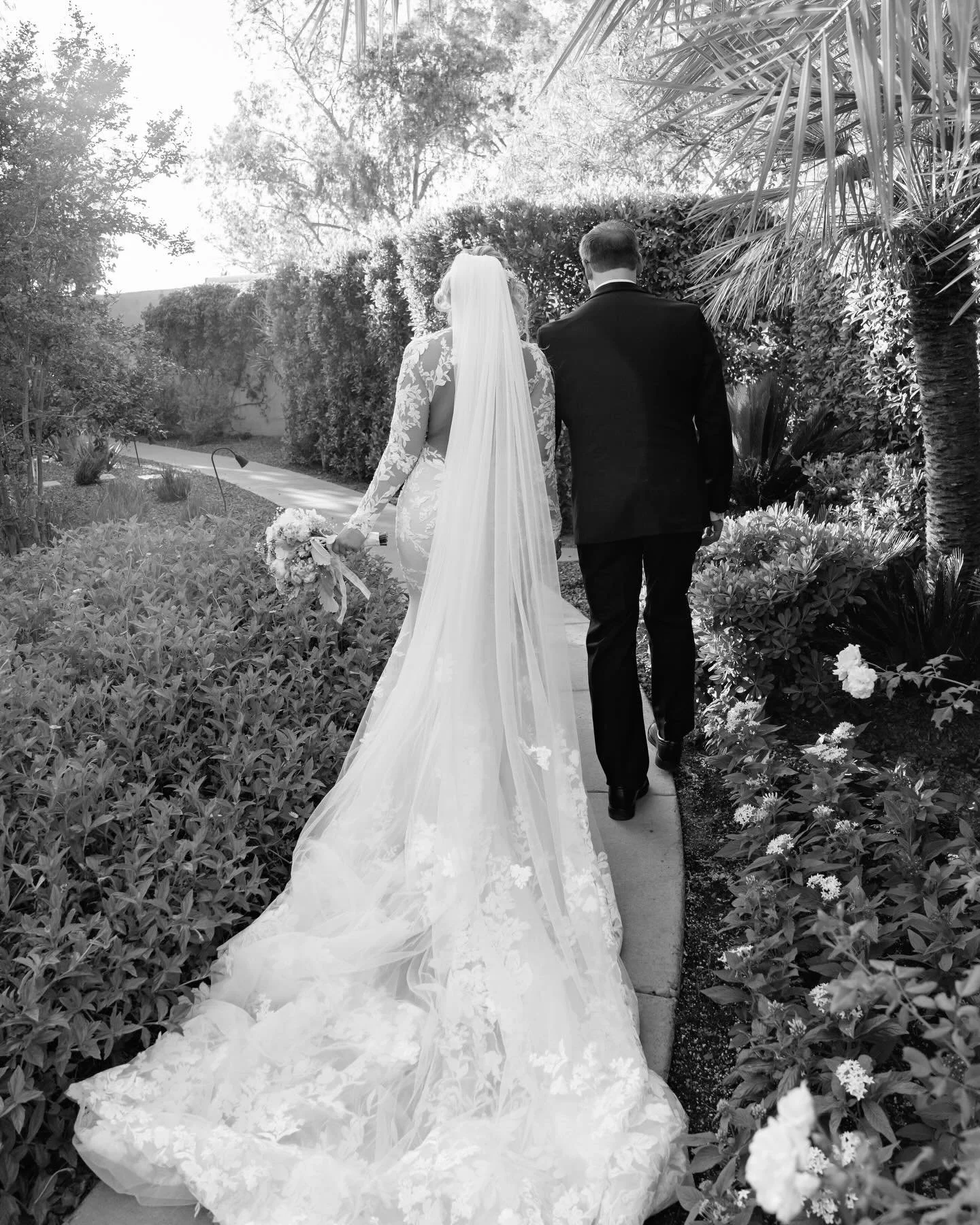 The in-between moments are the ones that stay with you&mdash;the quiet pauses, the movement, the feeling of it all. 🤍💍

Venue: @royalpalmsweddings 
Photo: @preciouspicspro