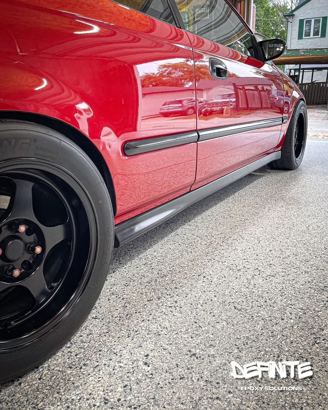 Epoxy with Tidal Wave Flakes with Polyaspartic Topcoat