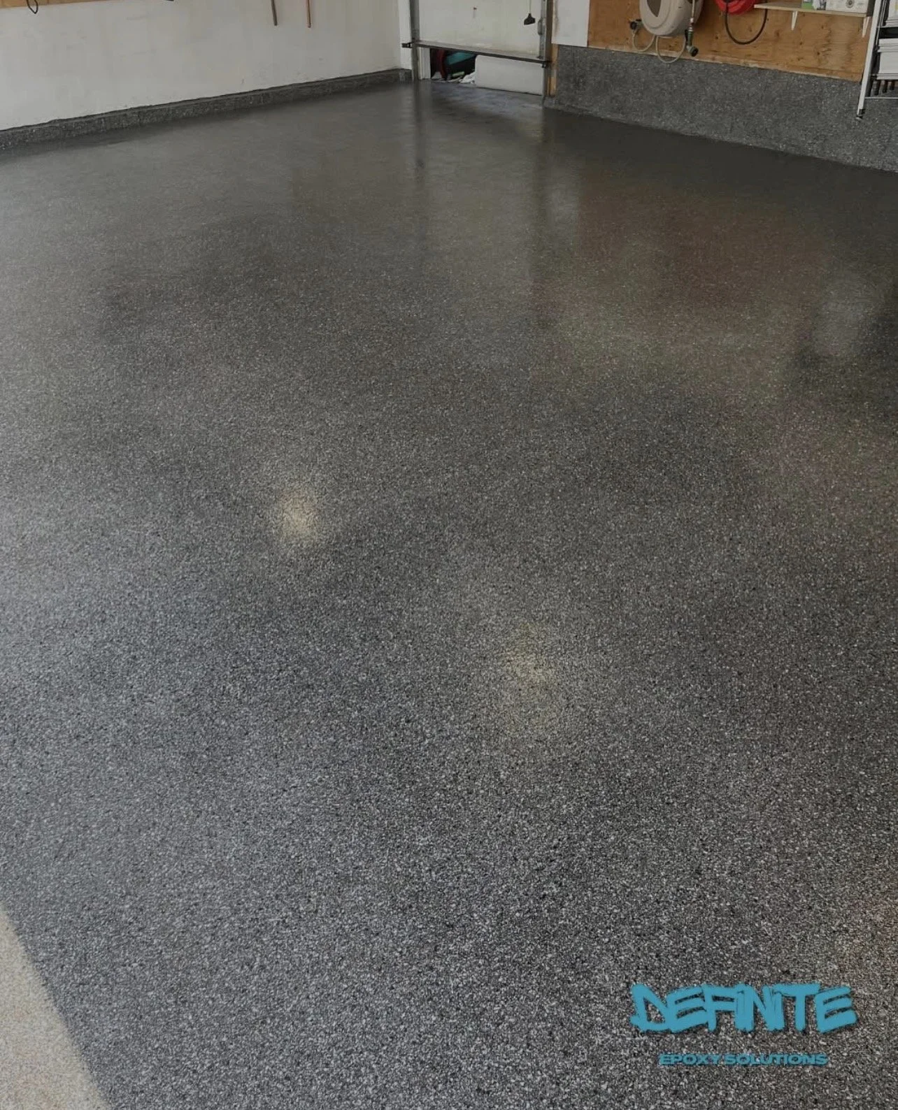 Epoxy with Nightfall Flakes with Polyaspartic Topcoat