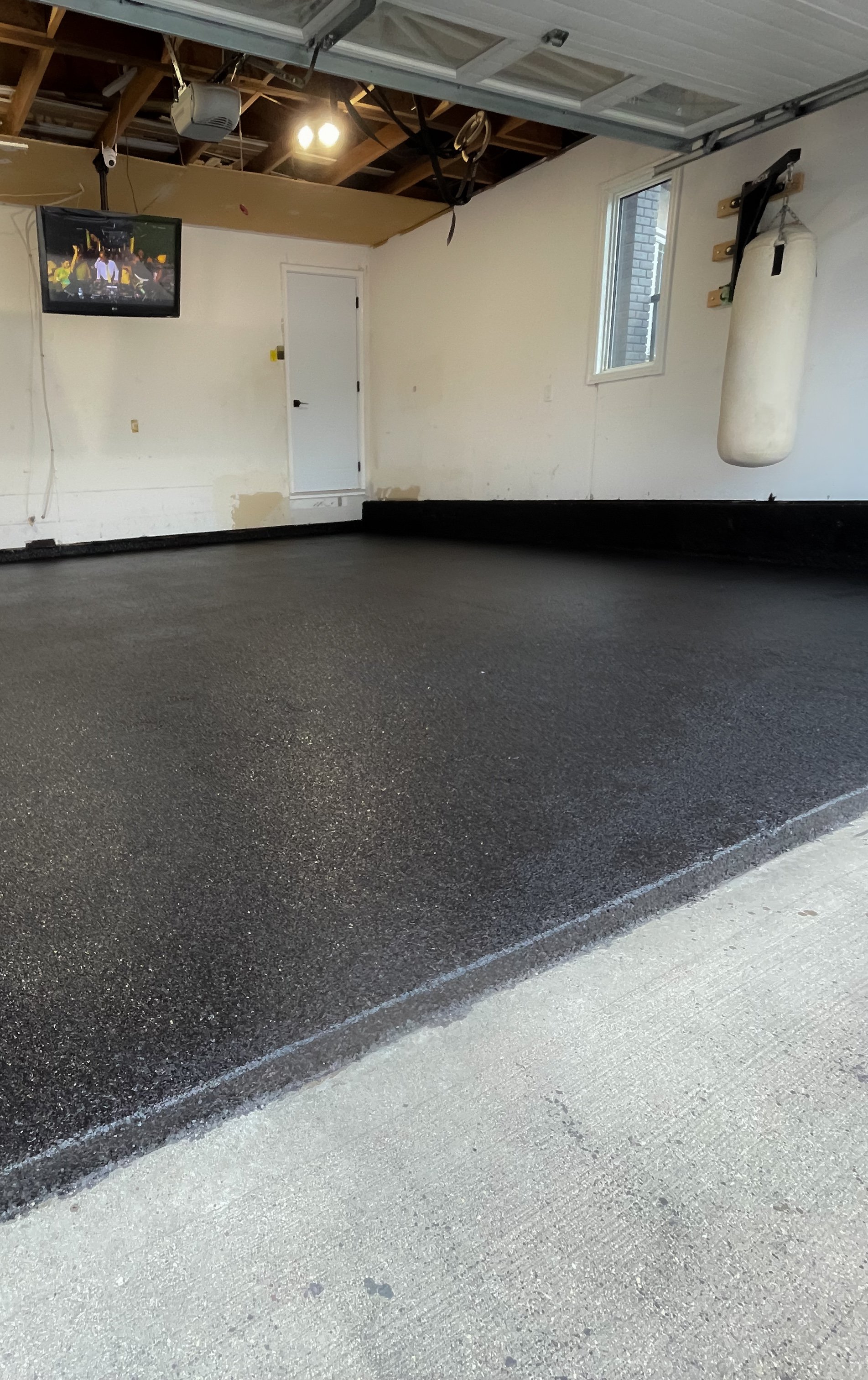 Epoxy with Carbon Flakes with Polyaspartic Topcoat
