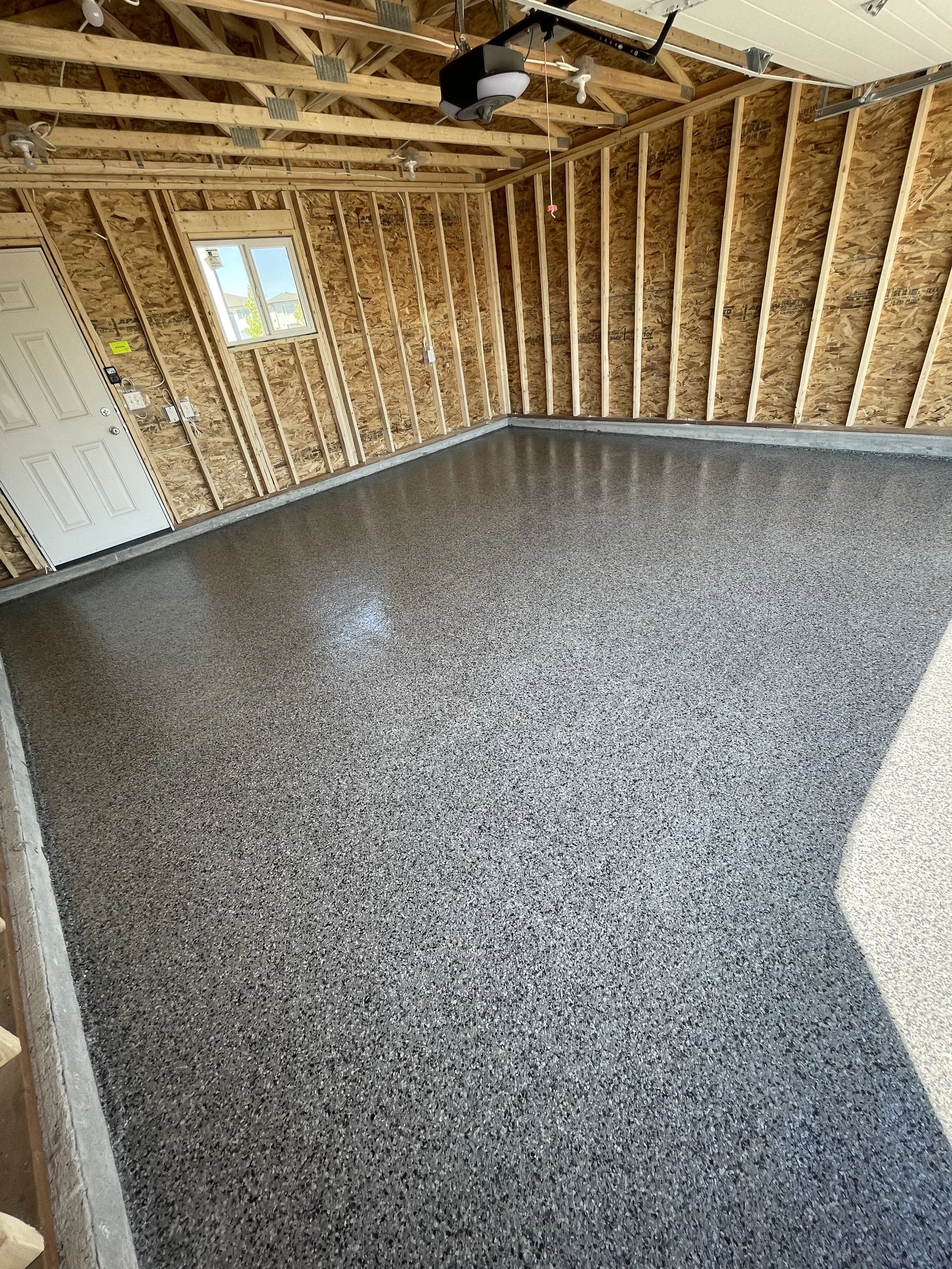 Epoxy with Nightcall Flakes with Polyaspartic Topcoat