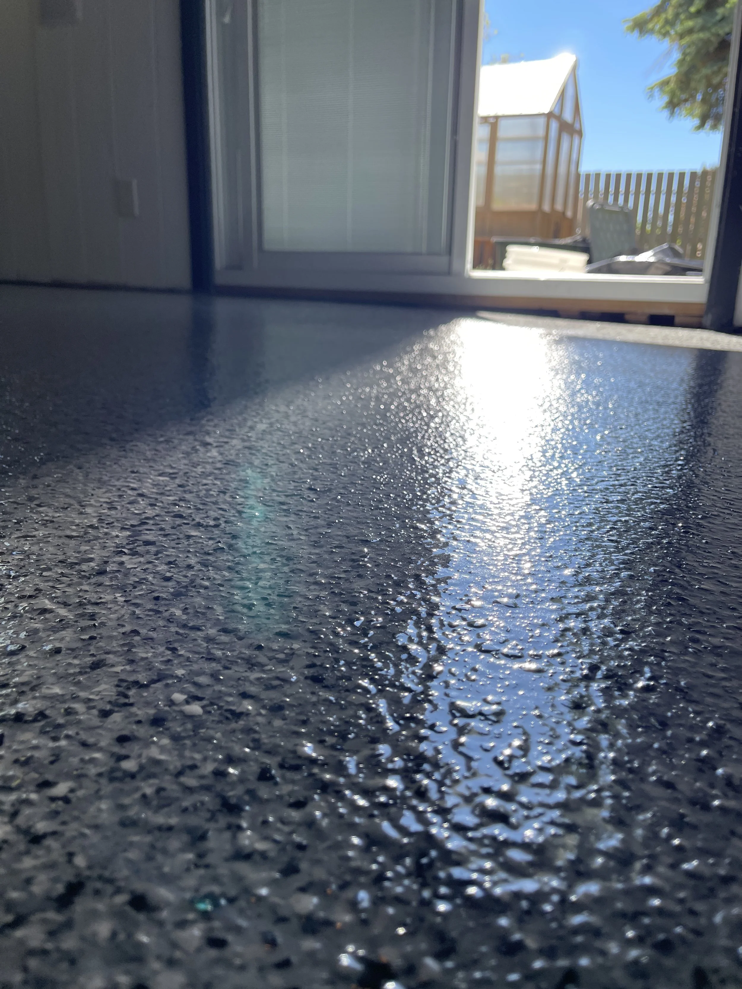 Epoxy with Nightfall Flakes with Polyaspartic Topcoat