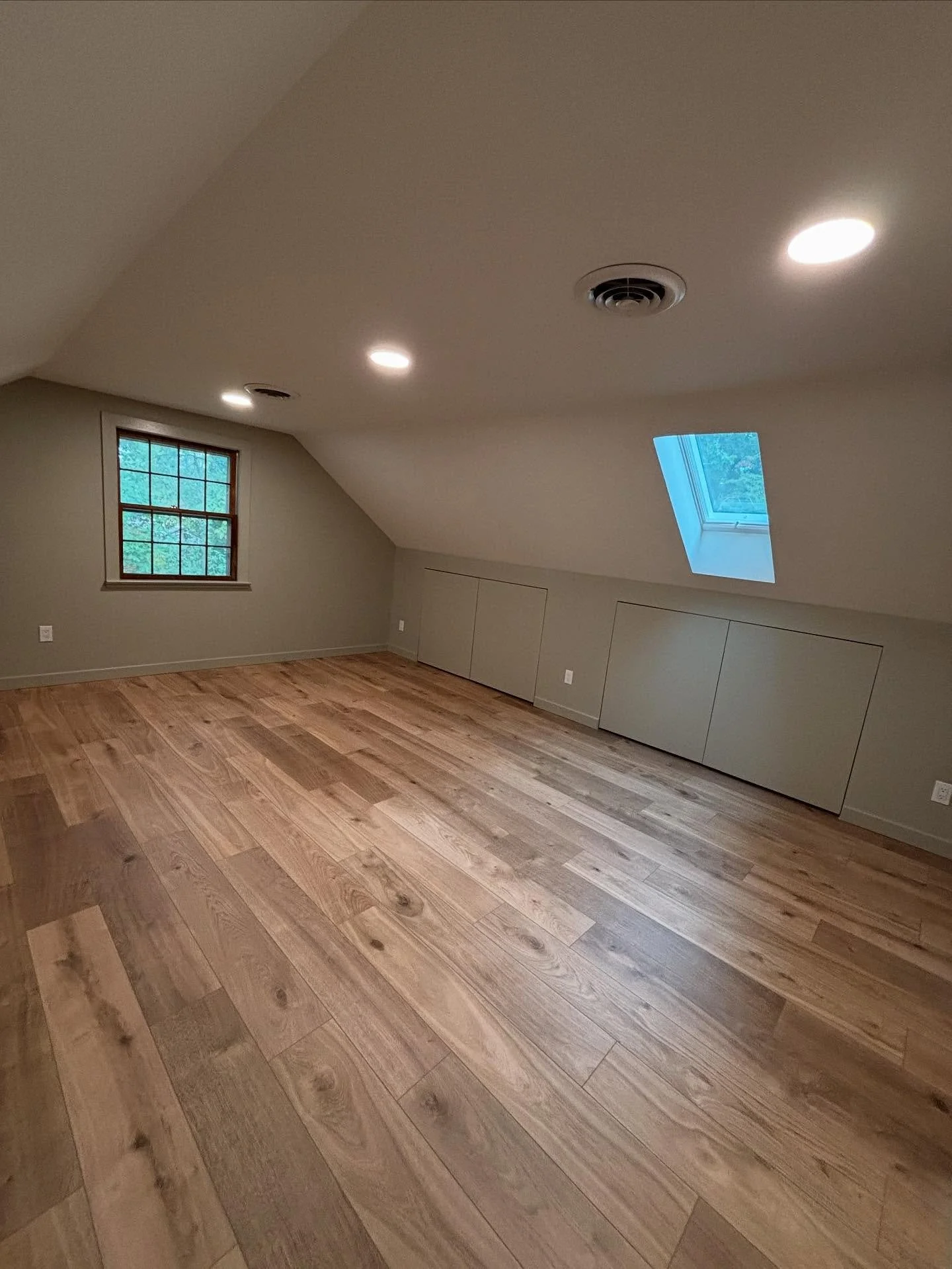 A little love, a little update, and a lot of sweat transforming this dark attic storage room into a scandi inspired multi use space! 

With oversized knee wall storage doors, new lvp flooring, updated closet functionality, and all new sheet rock, thi