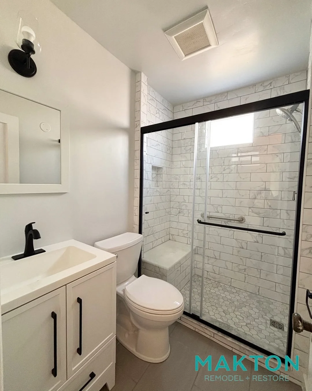 Talk about a glow up 😍 From drab to fab, we couldn&rsquo;t be more excited for the way this turned out!

With all new tile, bench seat, larger vanity, and natural light, this down and out bathroom breathes new life. We were surprised to find that so