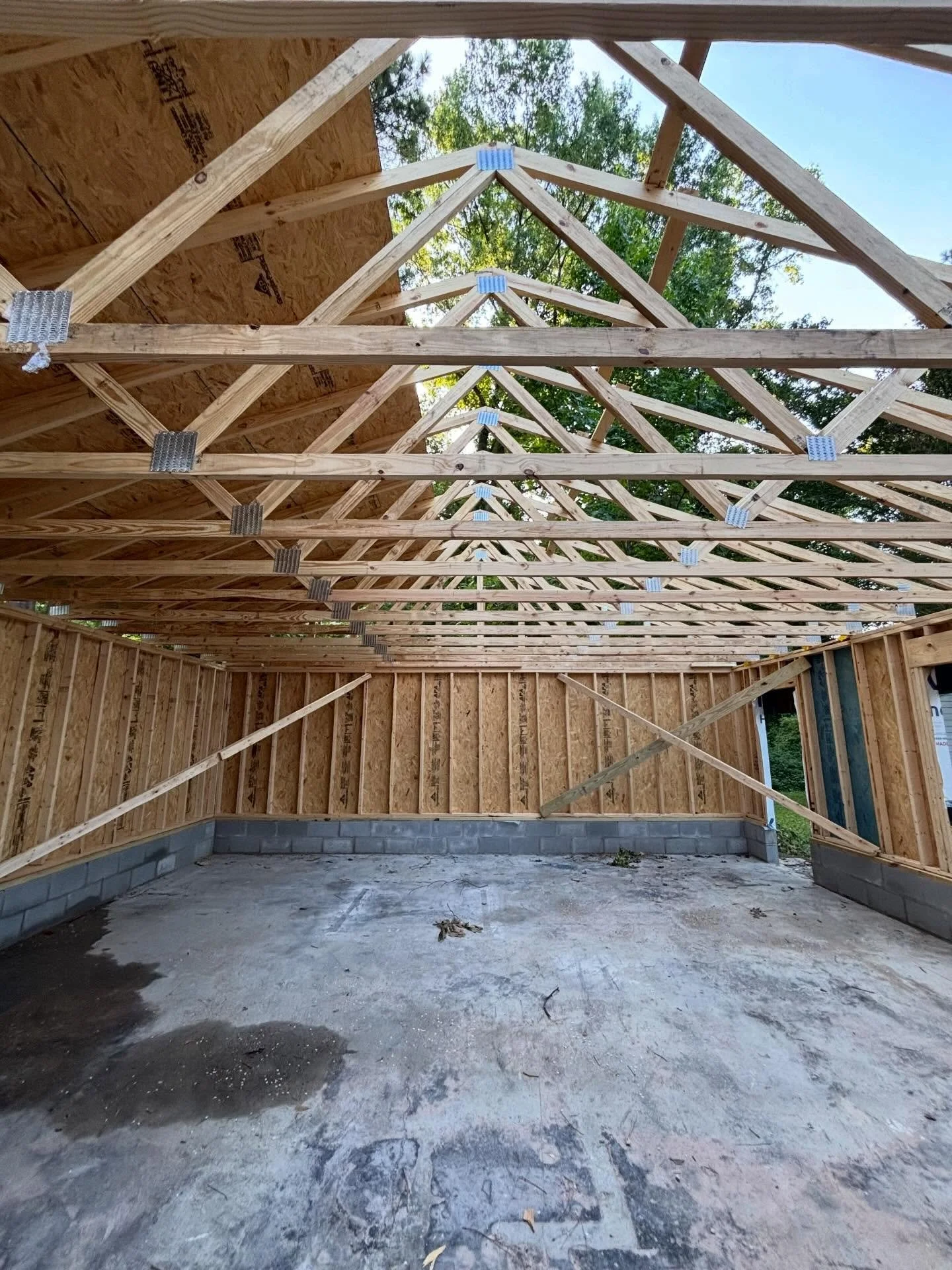 Foundation, structure, roofing/siding, MEP, insulation, drywall, floors, trim, cabinets, paint. 

A home is just a house until you add your life to it. Your belongings, your style, your scent. Kids drawing on the walls, cats scratching the furniture,