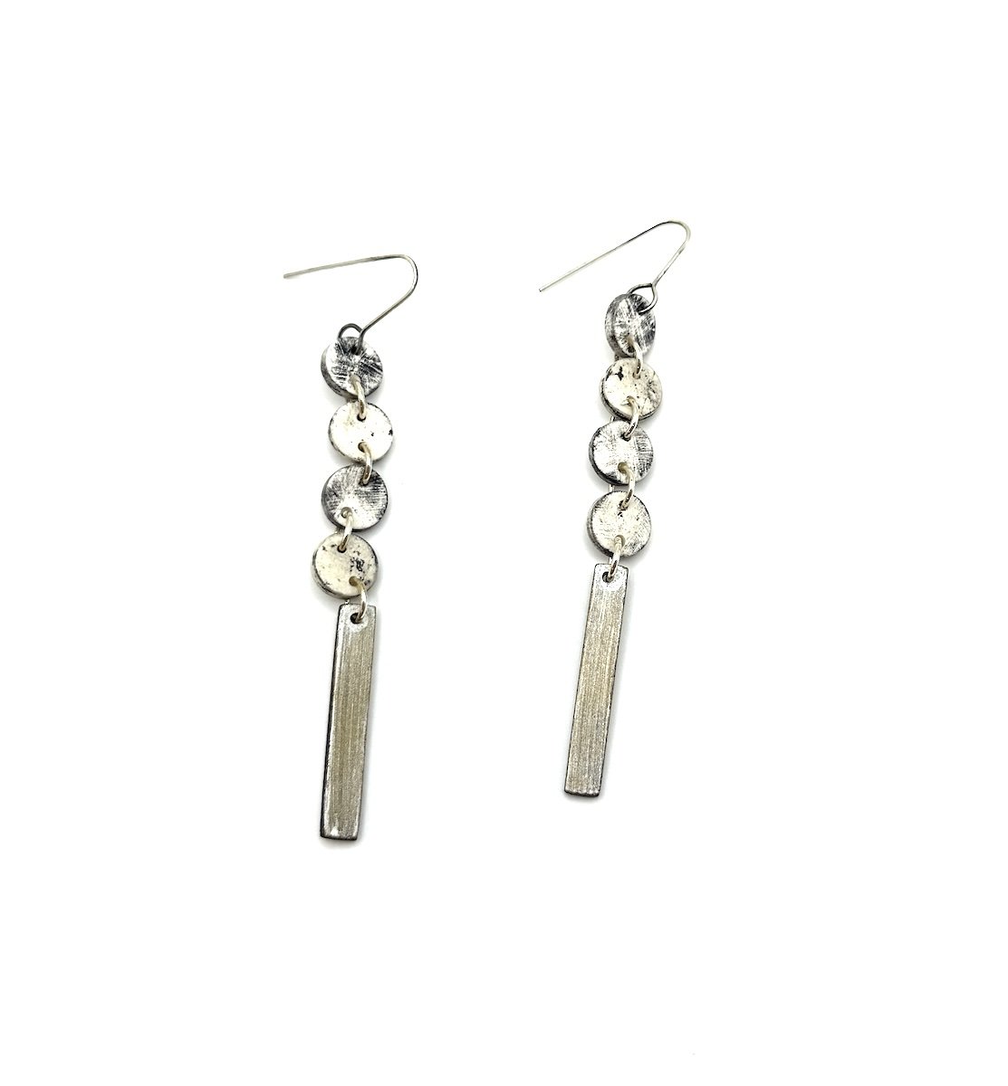 Genevieve Williamson metallic long dangle earrings.jpeg
