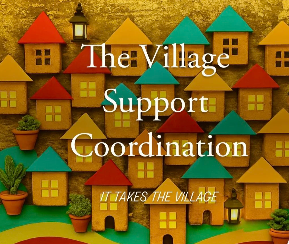 Colorful miniature wooden houses with bright roofs, small potted plants, and lanterns, symbolizing a village scene with text overlay reading 'The Village Support Coordination' and 'It takes the village'.