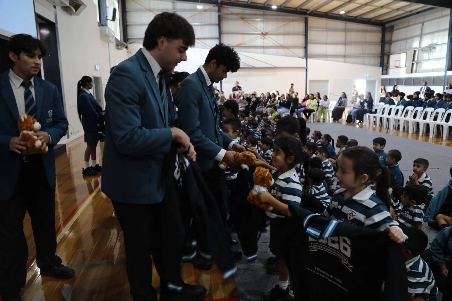 This morning, we held our Year 12 Jacket Ceremony with a surprise for our youngest students 🧸. Class by class, our Preps and Year 12s lined up to exchange jackets and a Good News Lutheran College teddy bear &mdash; a sweet moment symbolising the beg