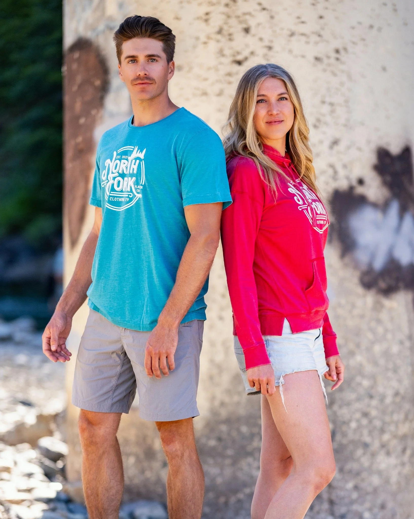 Our vintage-inspired NorthFork circle graphic representing Placer County roots on a bold turquoise tee and a women's red light-weight hoodie.

Shop link in bio.
Use code BODEGA at checkout to waive shipping fees and pick-up @the_auburn_bodega

Photo 