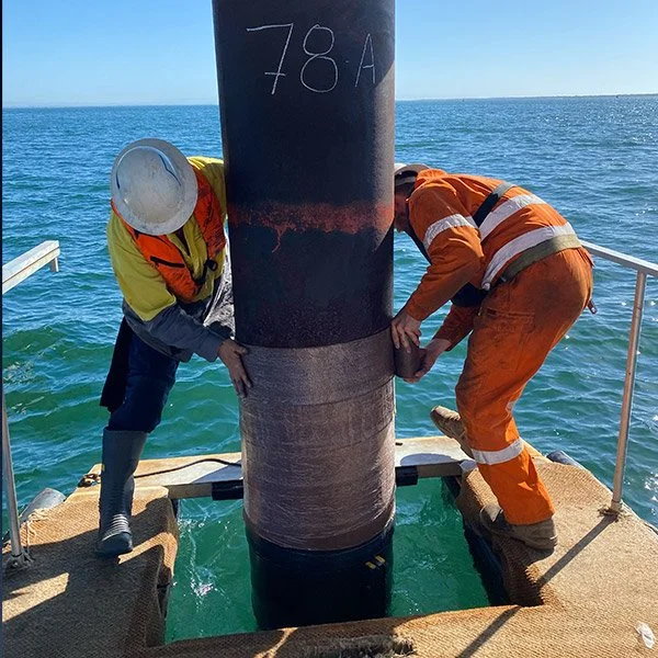 Aegir Divers Team performing Wharf Maintenance using Preservative Materials on Wharf Piles