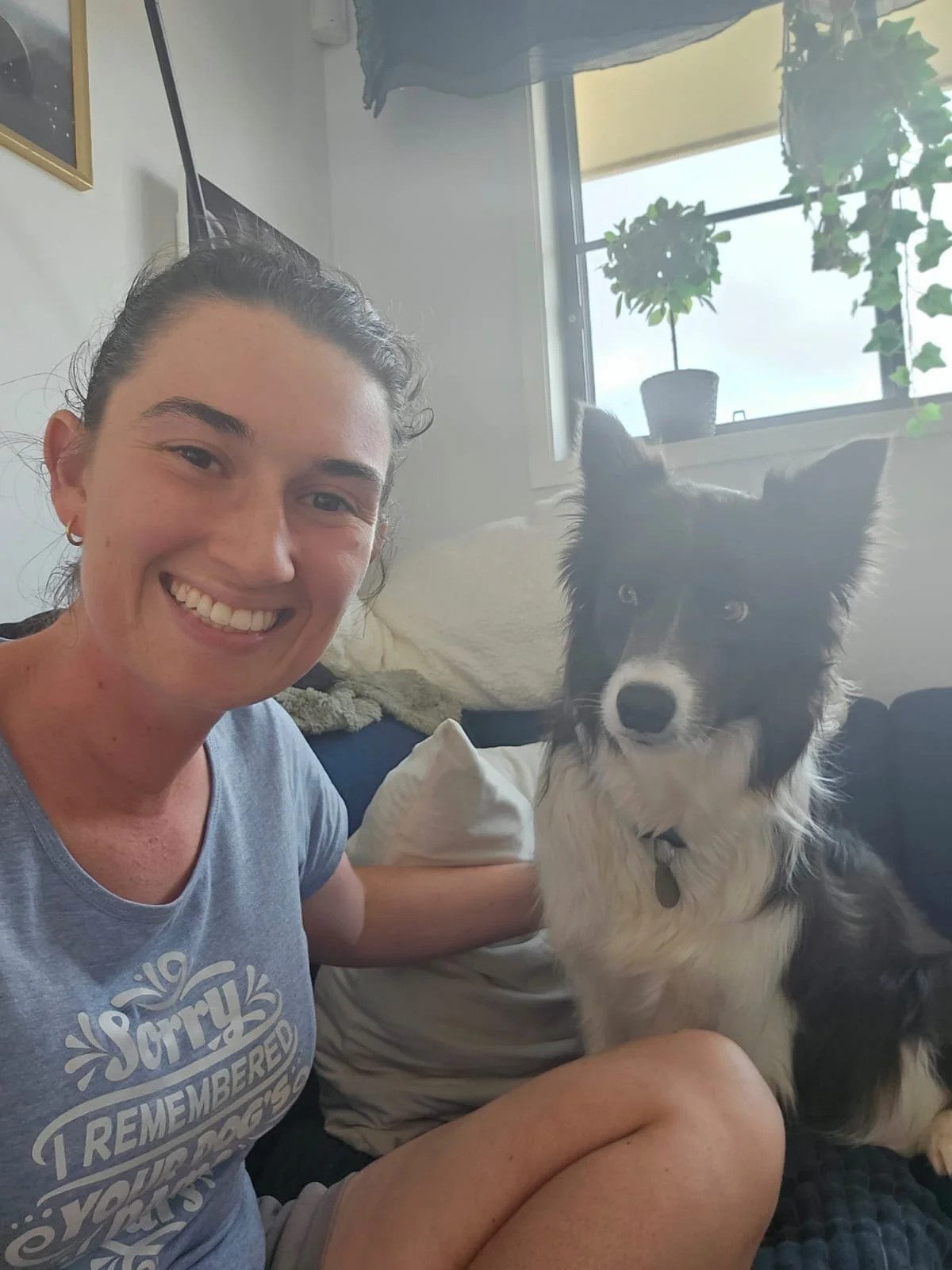 A selfie with a Border Collie pup looking at me to lick my face