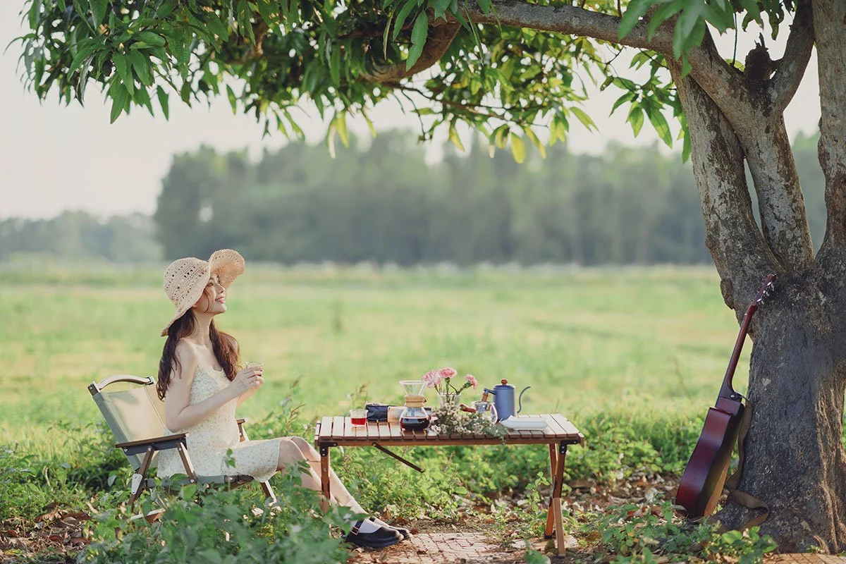 Latte art pour with Bold Reverie Decaf – an elegant coffee ritual at dusk