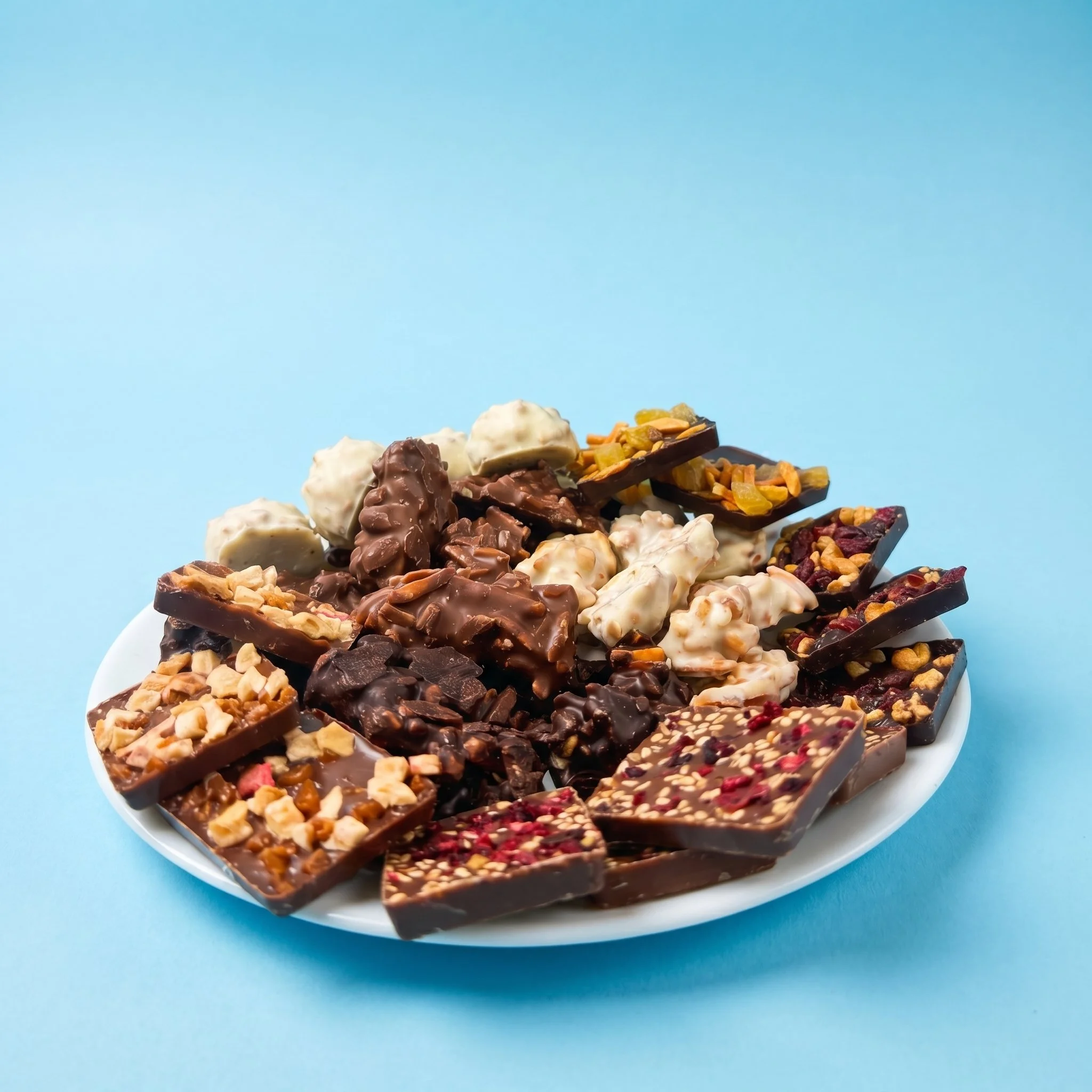 différents carrés de chocolat en vrac issus de chez Encore & Encore