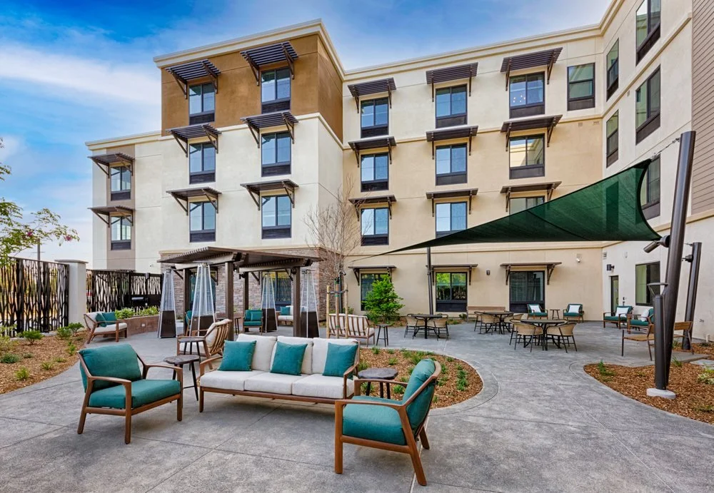 Shade canopies facilitate the indoor-outdoor connection by increasing comfortability and dining area options