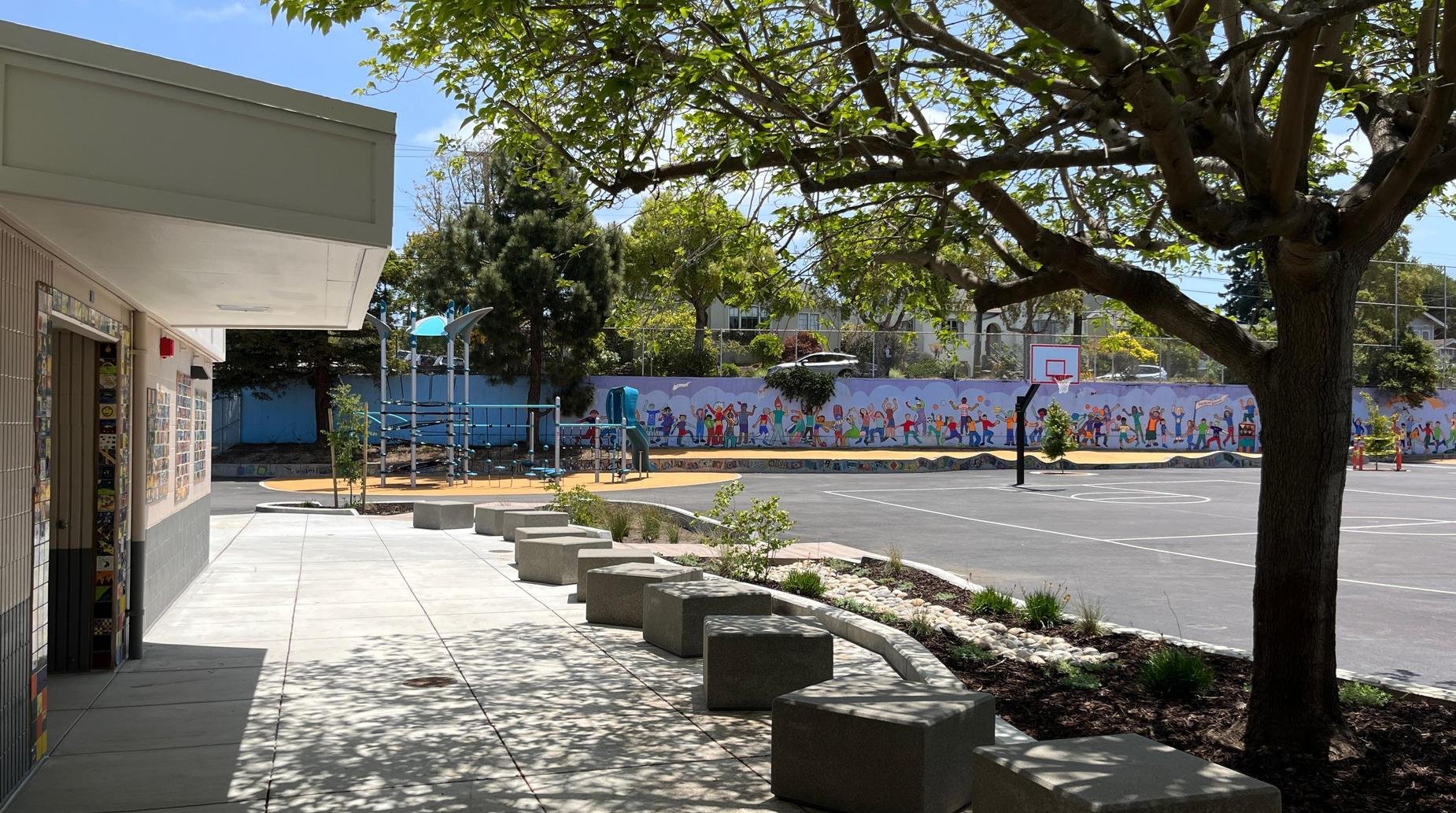 Flexible seating and shaded outdoor spaces extend learning beyond the classroom, encouraging discovery, collaboration, and hands-on engagement with the landscape.