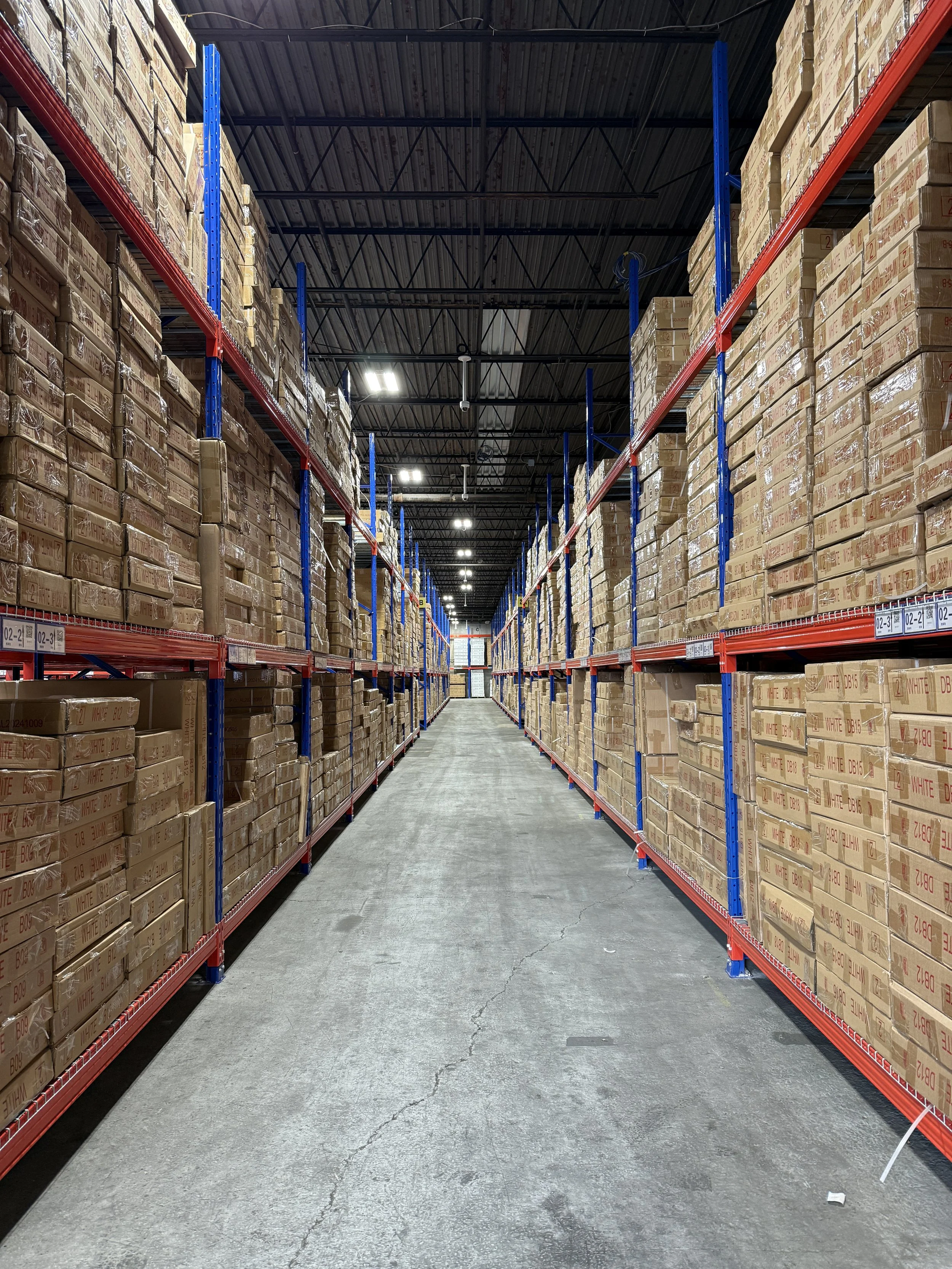 Wood finish RTA cabinets stocked in U.S. warehouse for contractor projects