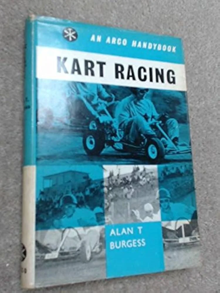 A book titled 'KART RACING', part of the Arco Handybook series, written by Alan T Burgess, features a cover with a blue-tinted photo of a man driving a go-kart and some other racing images.