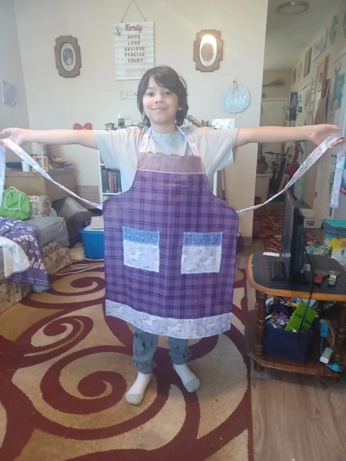 Our team member, Rachel, is in the process of sewing new aprons for a community cooking class. Her son loves showing them off!

We&rsquo;re so grateful to have such caring, creative people to work with each day. 💜