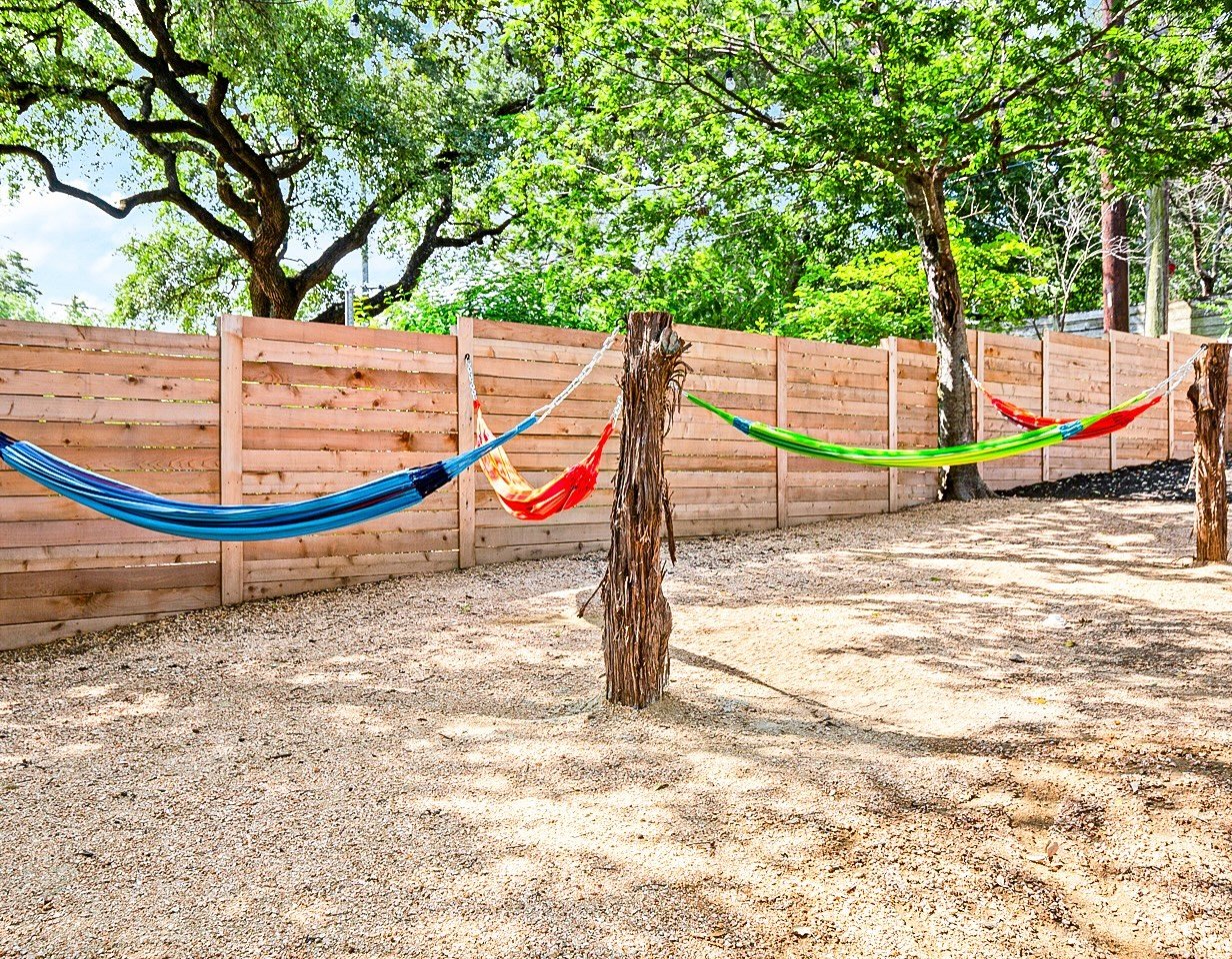 &ldquo;Nothing says relaxation like a hammock&mdash;but why stop at one? 🌈 This cozy setup with four vibrant hammocks brings a pop of color and plenty of chill to this outdoor space. Perfect for unwinding, soaking up some shade, and embracing those 