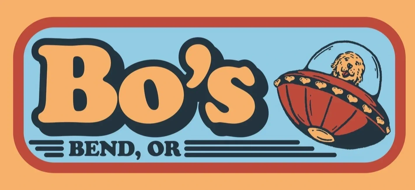 Vintage-style logo with the text 'Bo's Bend, or' and a cartoon image of a dog in a spaceship.