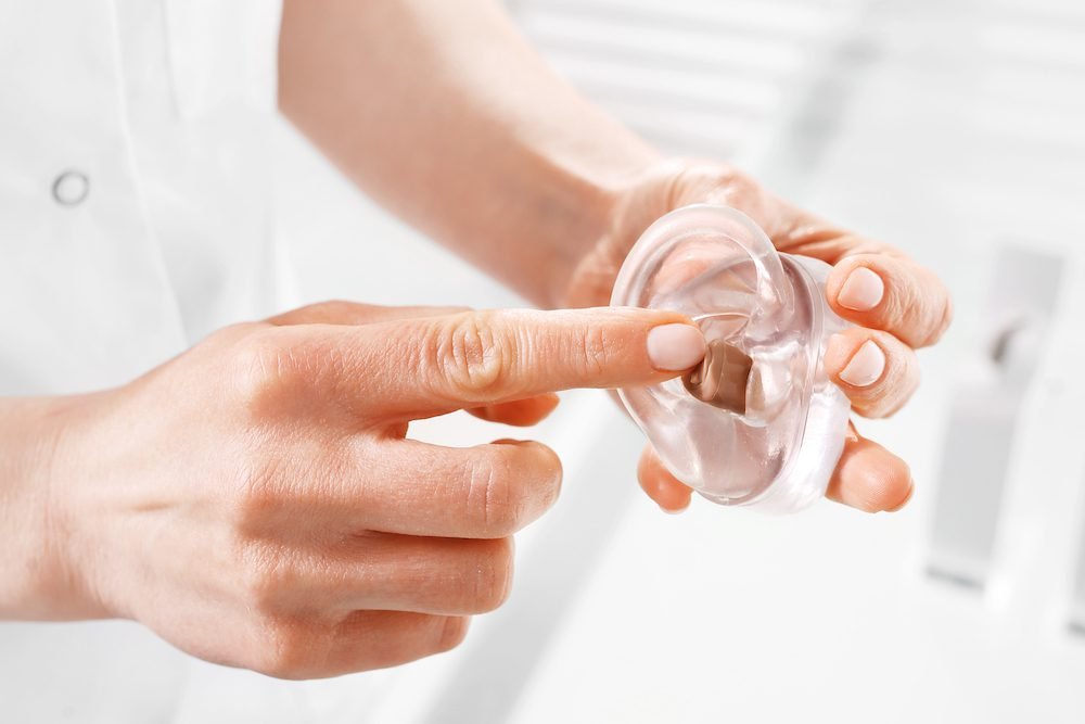 Hearing Aids vs Cochlear Implants