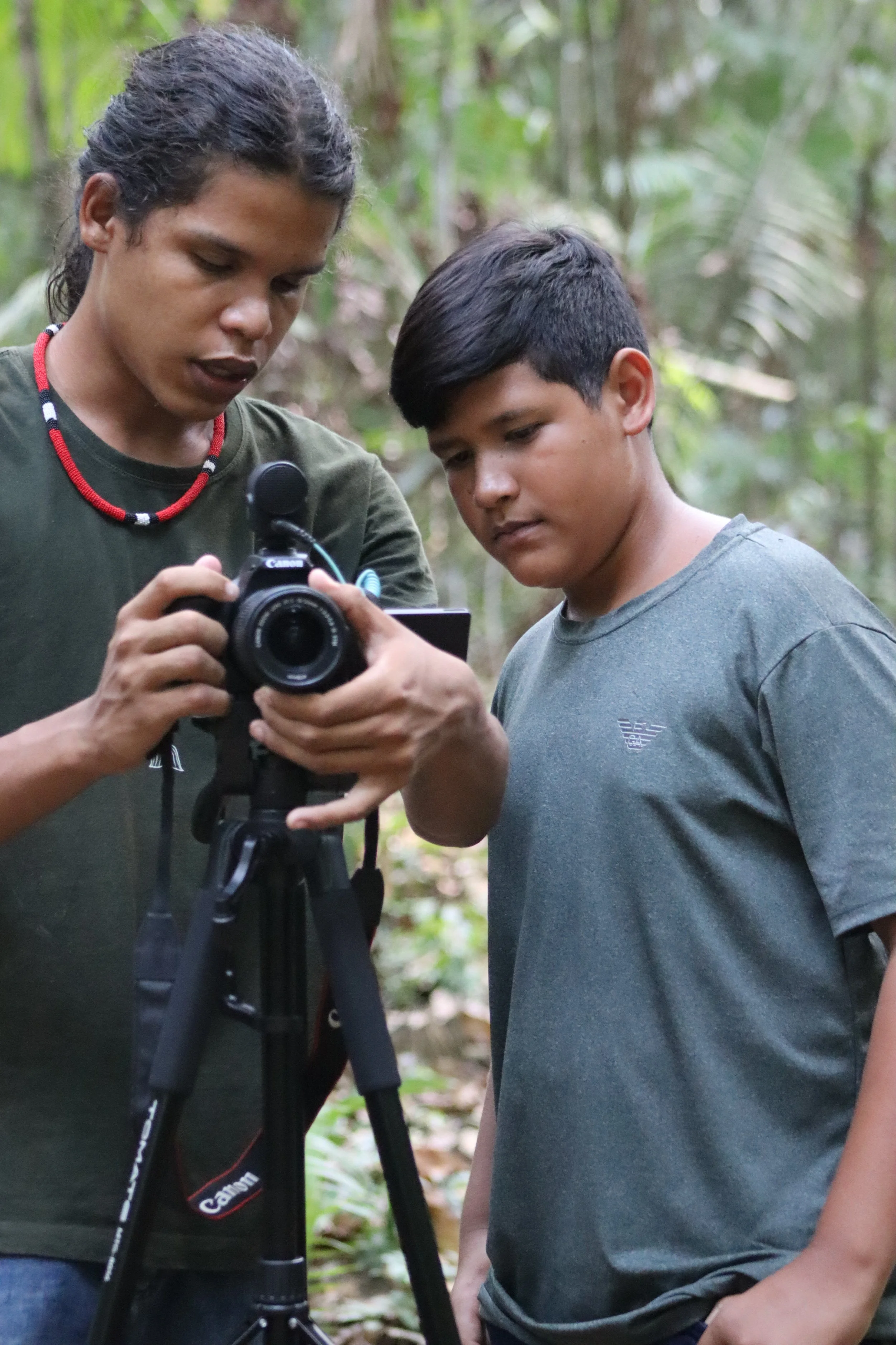 members of Xipaya AV team set up a camera