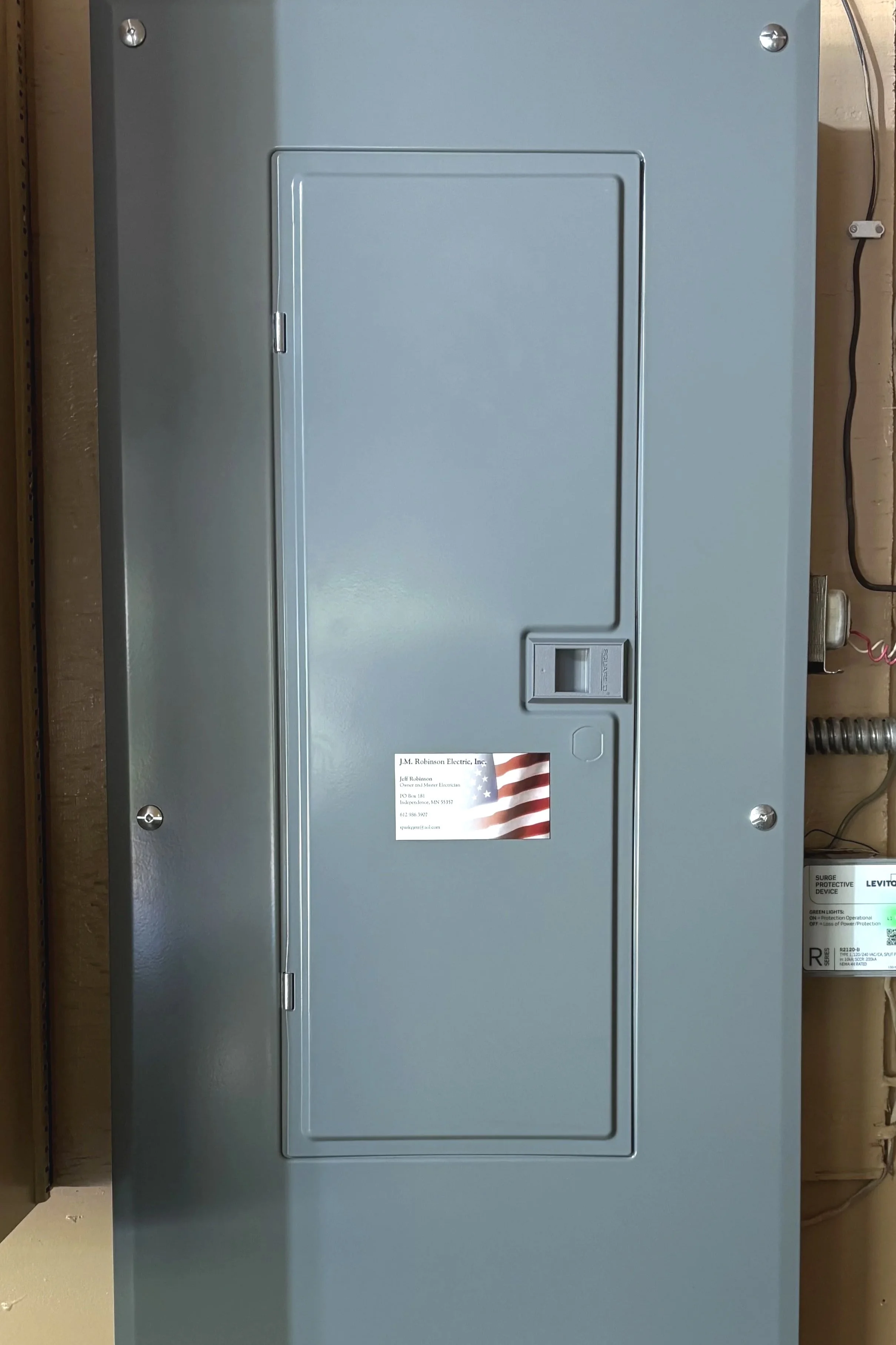 New electrical panel upgrade in Plymouth and Wayzata Minnesota featuring neatly organized wiring labeled breakers and code compliant installation by master electrician