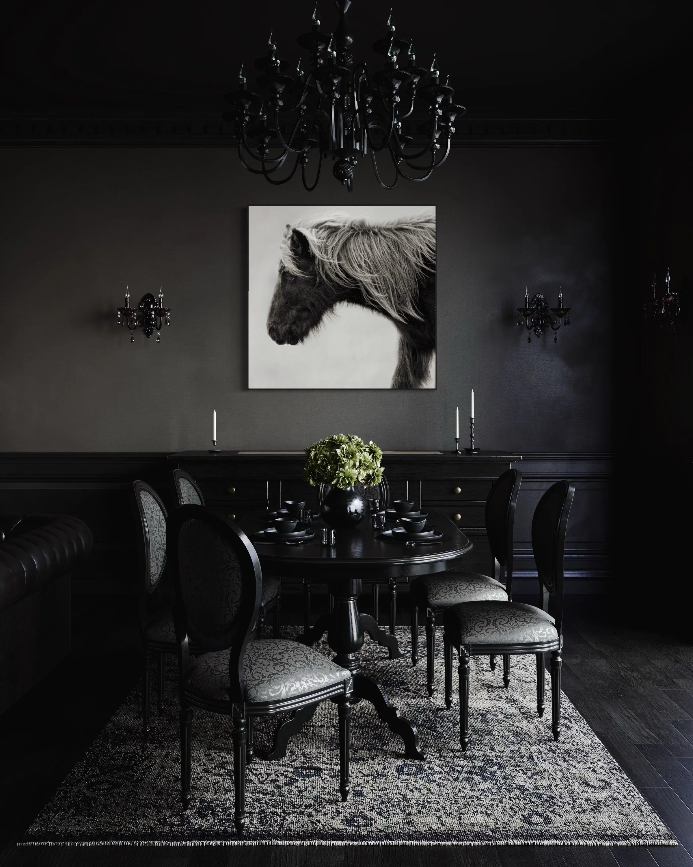 Elegant black dining room with ornate chandelier, black table and chairs, floral centerpiece, horse artwork, and wall sconces.