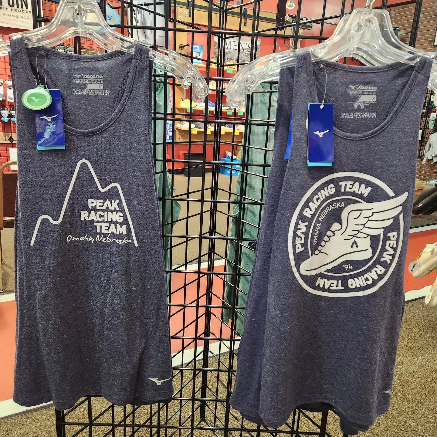 🔥 October heat wave is here! 🔥
Stay cool while you crush those miles in the Peak Racing Team tanks &mdash; available at all Peak Performance locations.

Run in style. Rep your favorite local run specialty store. 🏃&zwj;♀️🏃&zwj;♂️✨

#Run2Peak #Peak