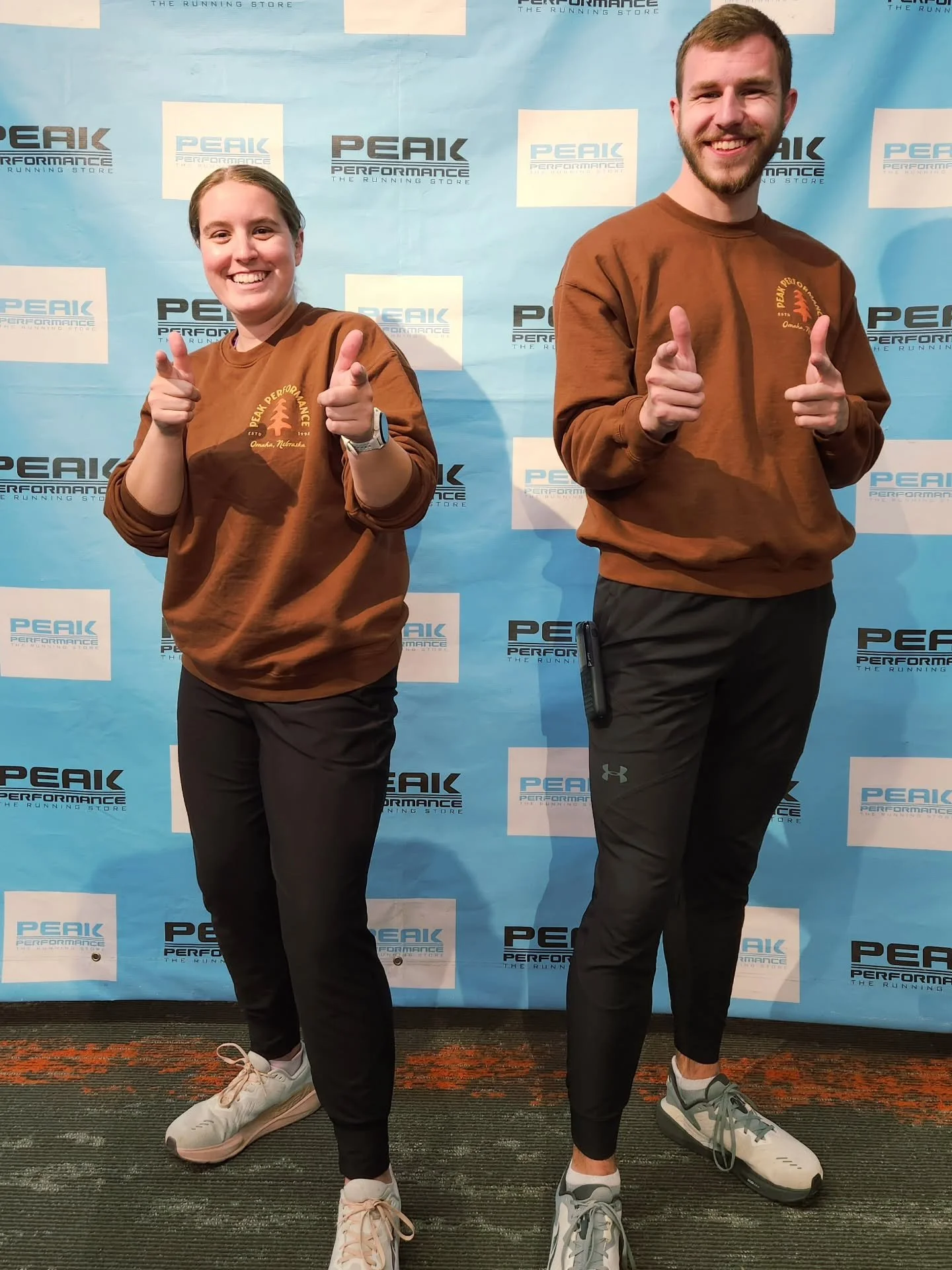 Sales associates Ainsley and Caleb showing off some serious team spirit &mdash; matching head to toe in Peak Performance sweatshirts, black pants, and their favorite Altra kicks. 👟✨

Who wore it best? 😉
#PeakPerformance #Run2Peak #Twinning #TeamPea