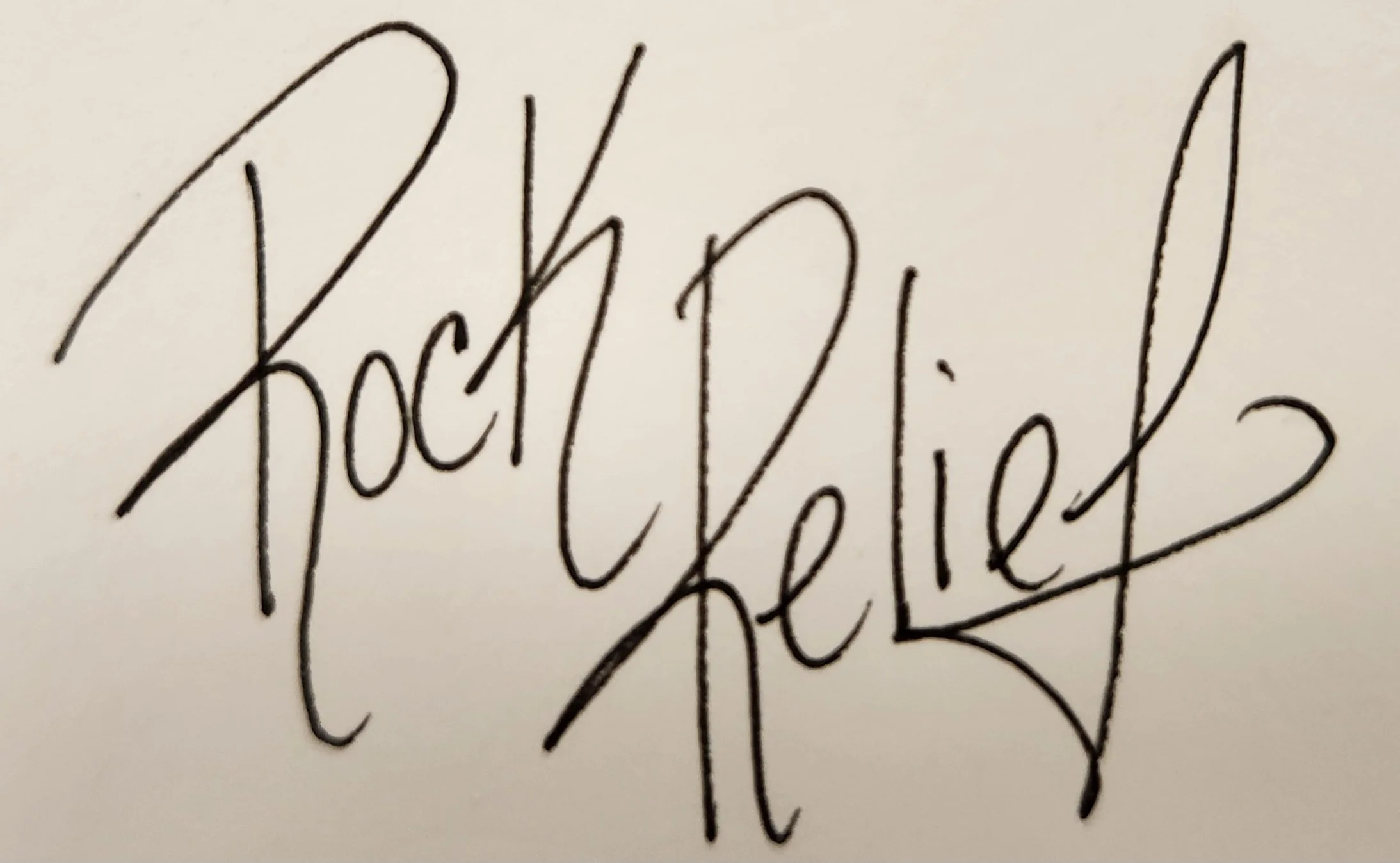 Handwritten autograph that says 'Rockefeller'