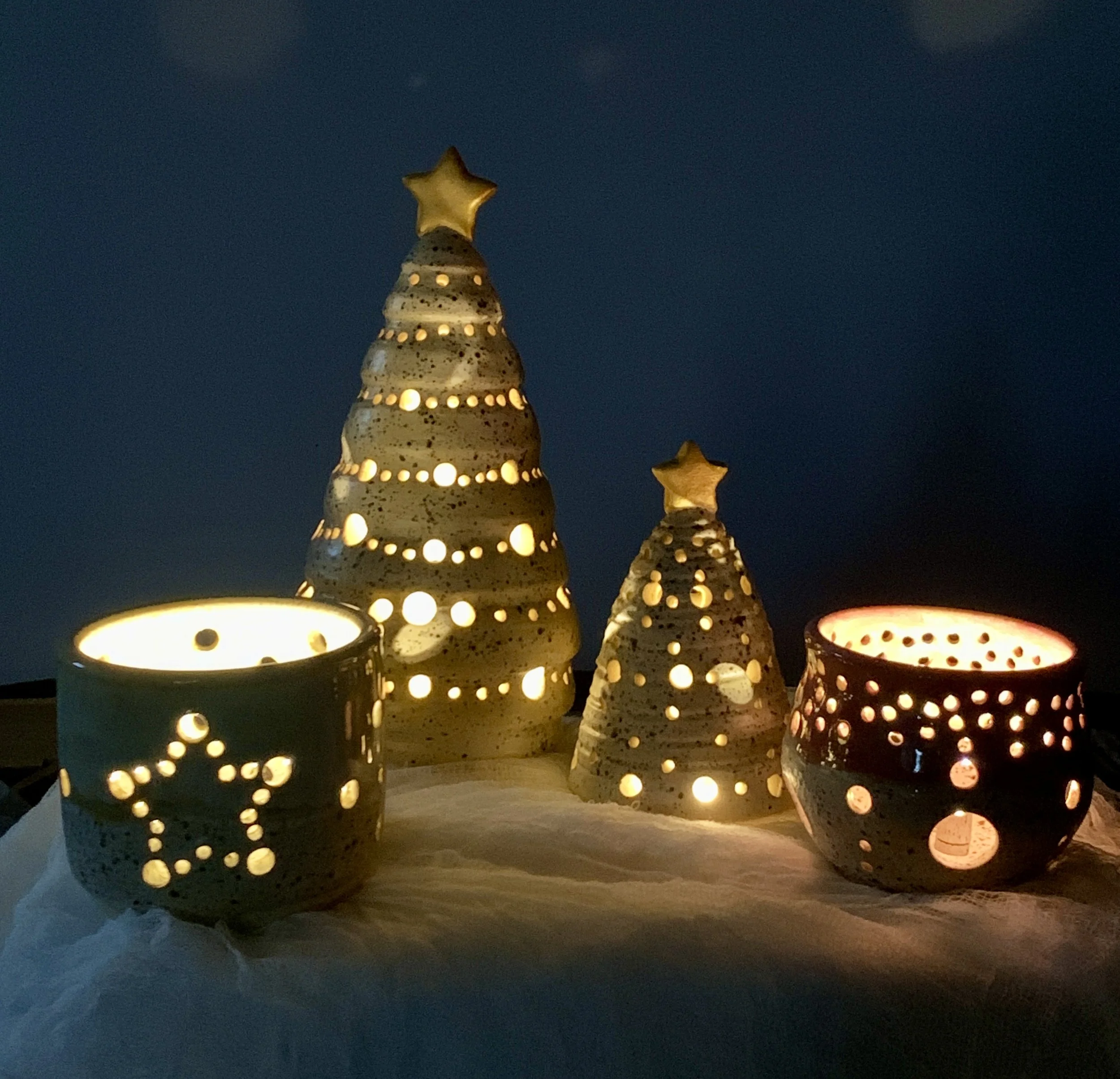 Ceramic tree-shaped ornament with starfish and shell details,