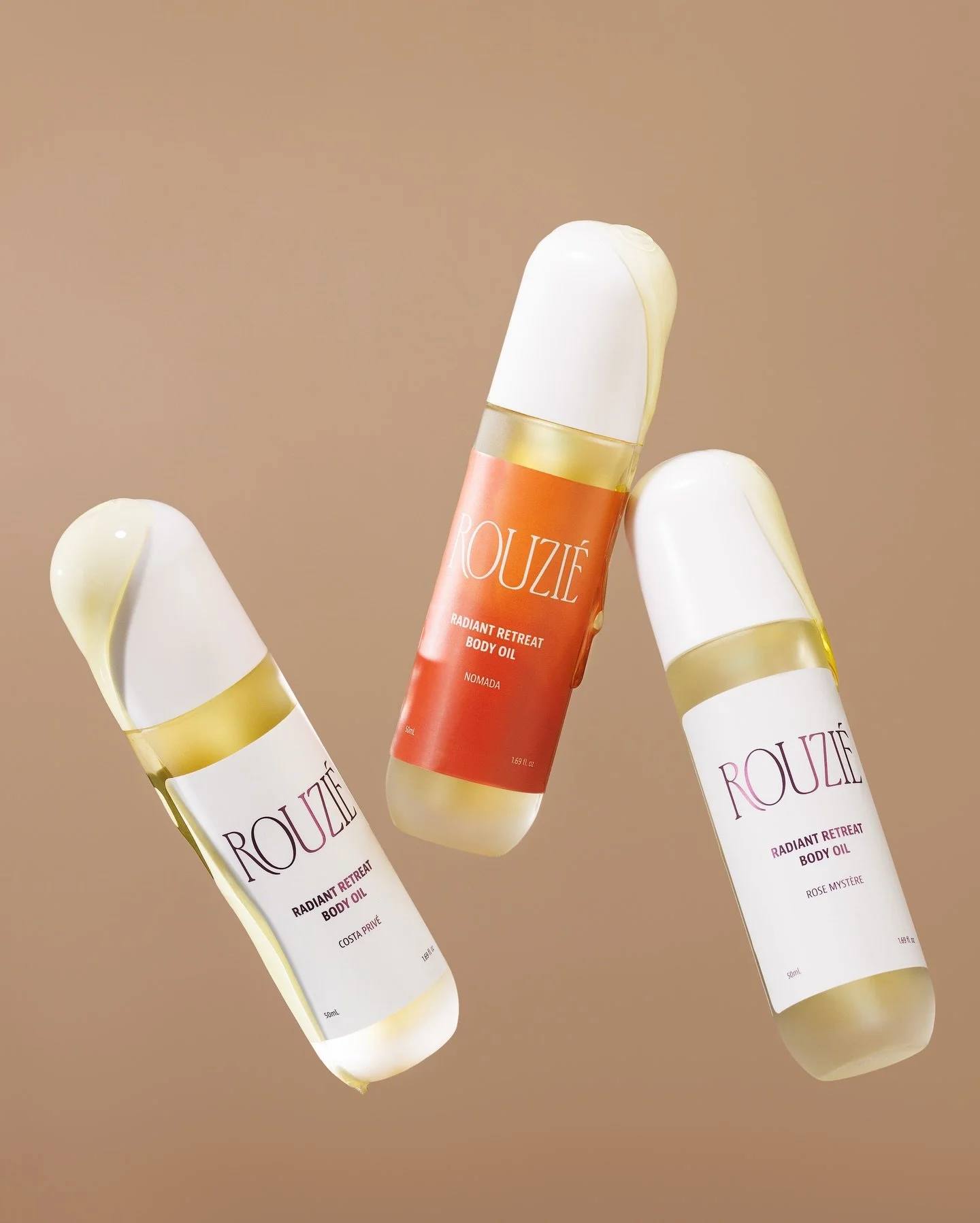 Some women have a signature scent. The Rouzi&eacute; woman has a rotation.
Three oils. Three entirely different versions of you: the sun-drunk one, the mysterious one, the soft one who takes her time.

Glow On The Go is your full scent wardrobe, pock
