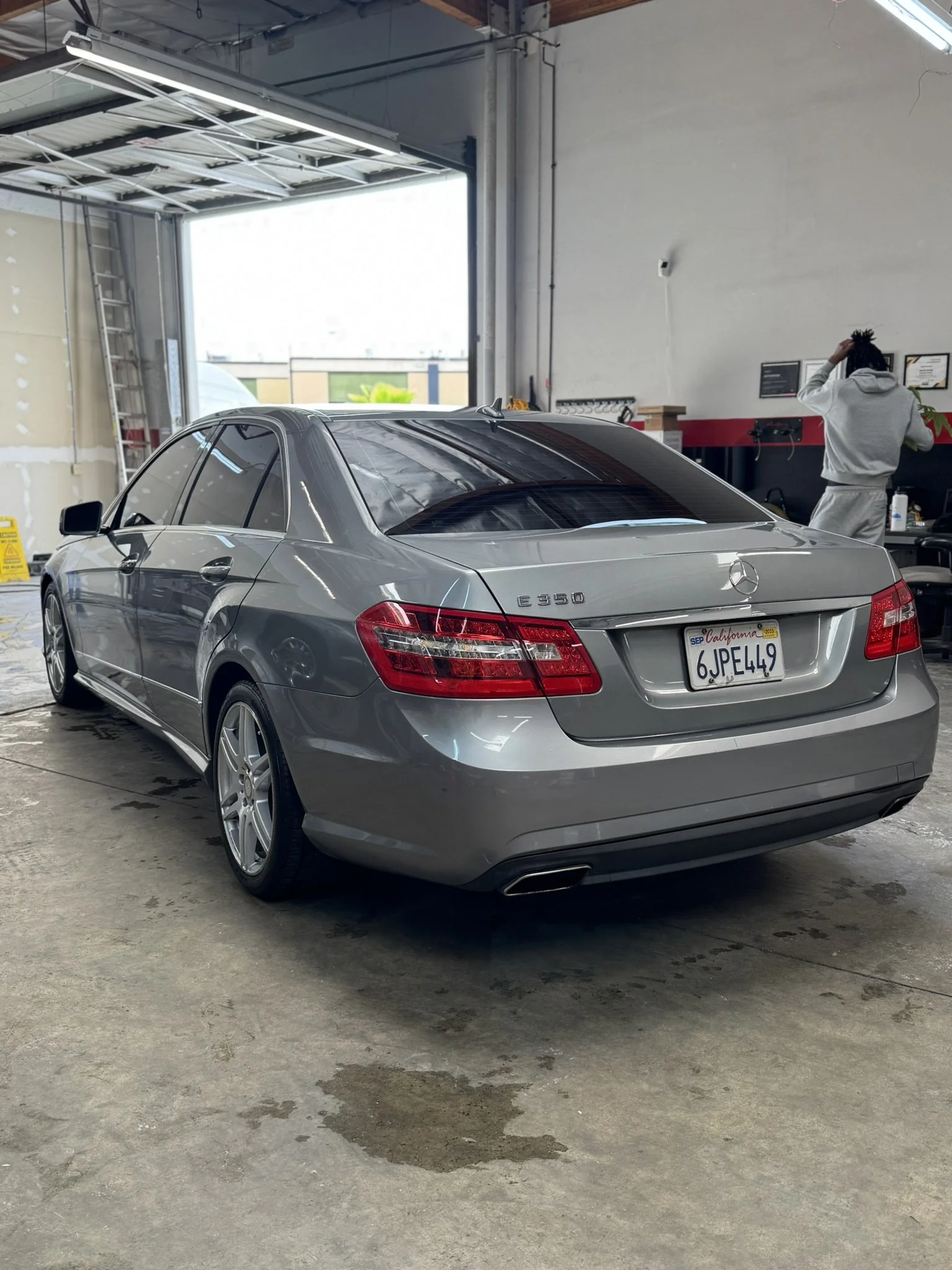 Silver Mercedes-Benz E350 sedan in garage