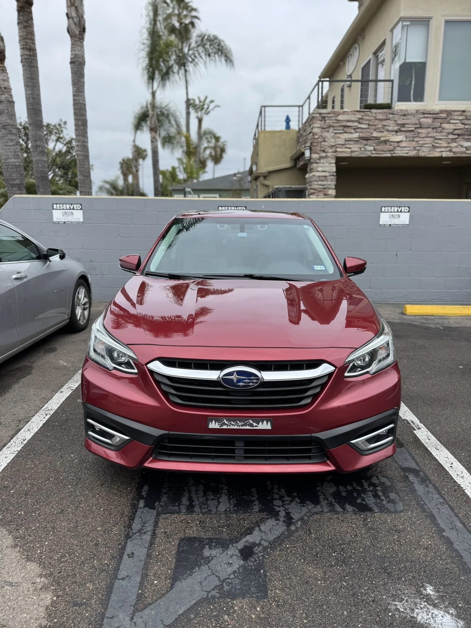 Red Subaru vehicle gloss and protection with ceramic coating at Golden State Auto Wash & Detail in San Diego