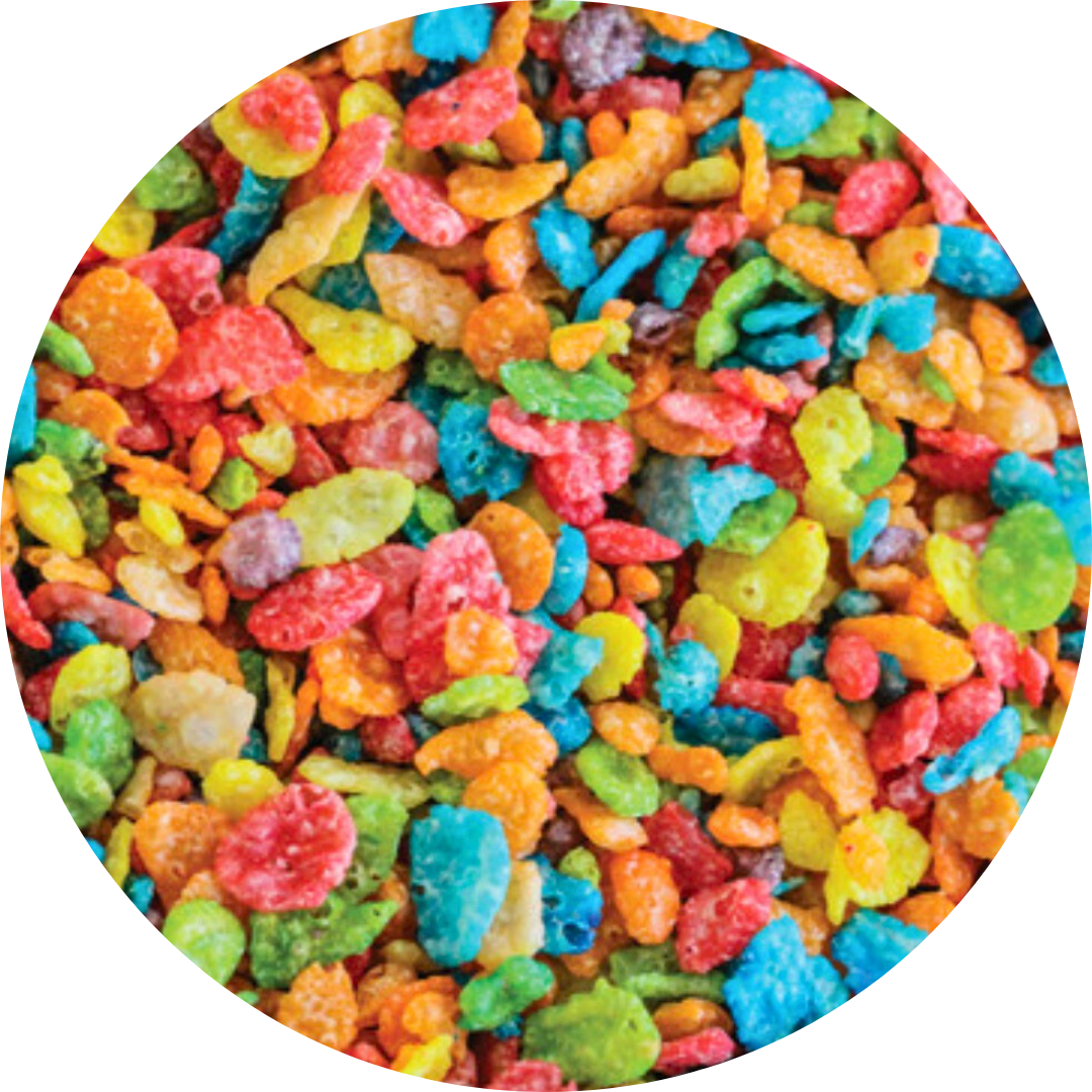 Close-up of colorful Cheetos snack food on a white plate.