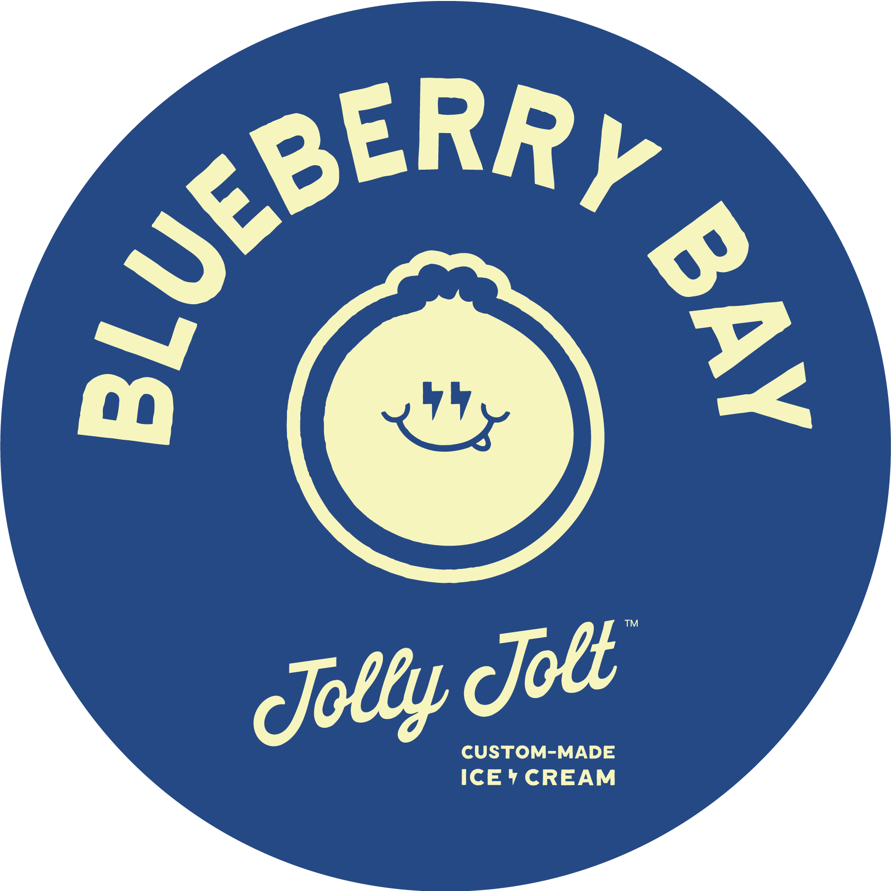 Blue circular logo for Blueberry Bay featuring a cartoon smiling blueberry with eyes closed, tongue slightly out, and lightning bolt details in the eyes. The text around the logo reads 'Blueberry Bay' at the top and 'Jolly Jolt' at the bottom, with additional text 'Custom-Made Ice Cream' below.