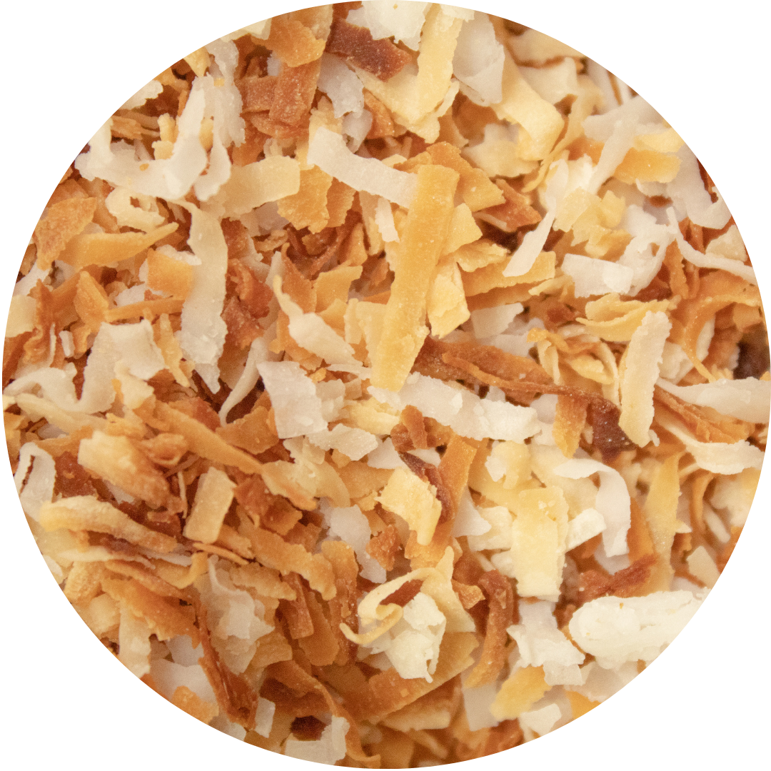 Close-up of shredded cheese mixture, including white, yellow, and orange shredded cheese.