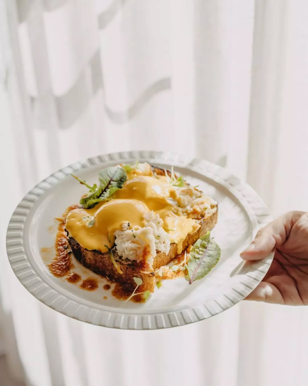 Thursdays taste better by the ocean. Our Shark Bay crab benedict with poached eggs, wood-fired sourdough and nduja hollandaise, paired with the sea breeze and rhythm of the waves. See you all from 8am. 

Reserve now, link in bio.
