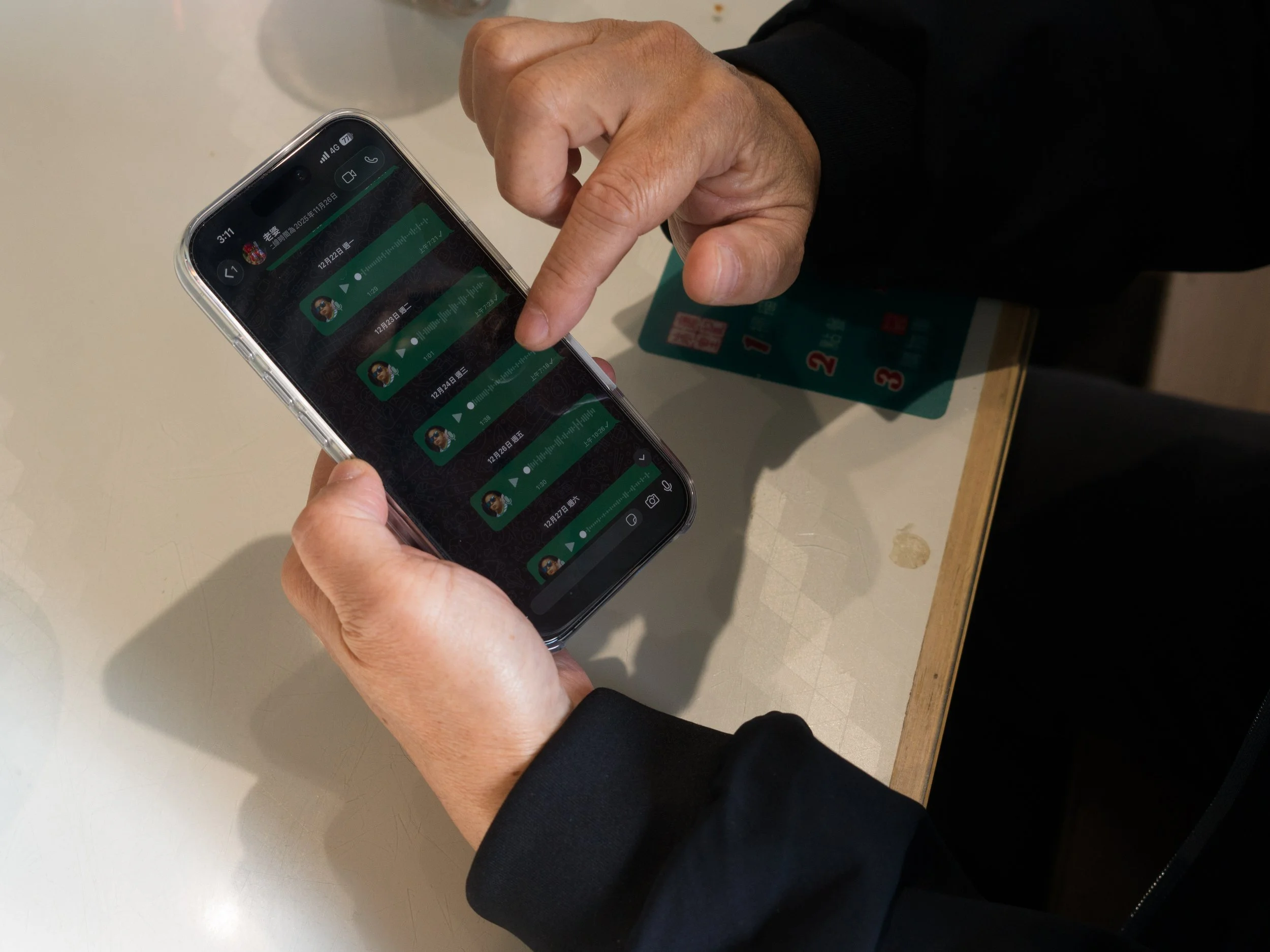 Yip shows CNN the voice notes he sends to his wife every day. 