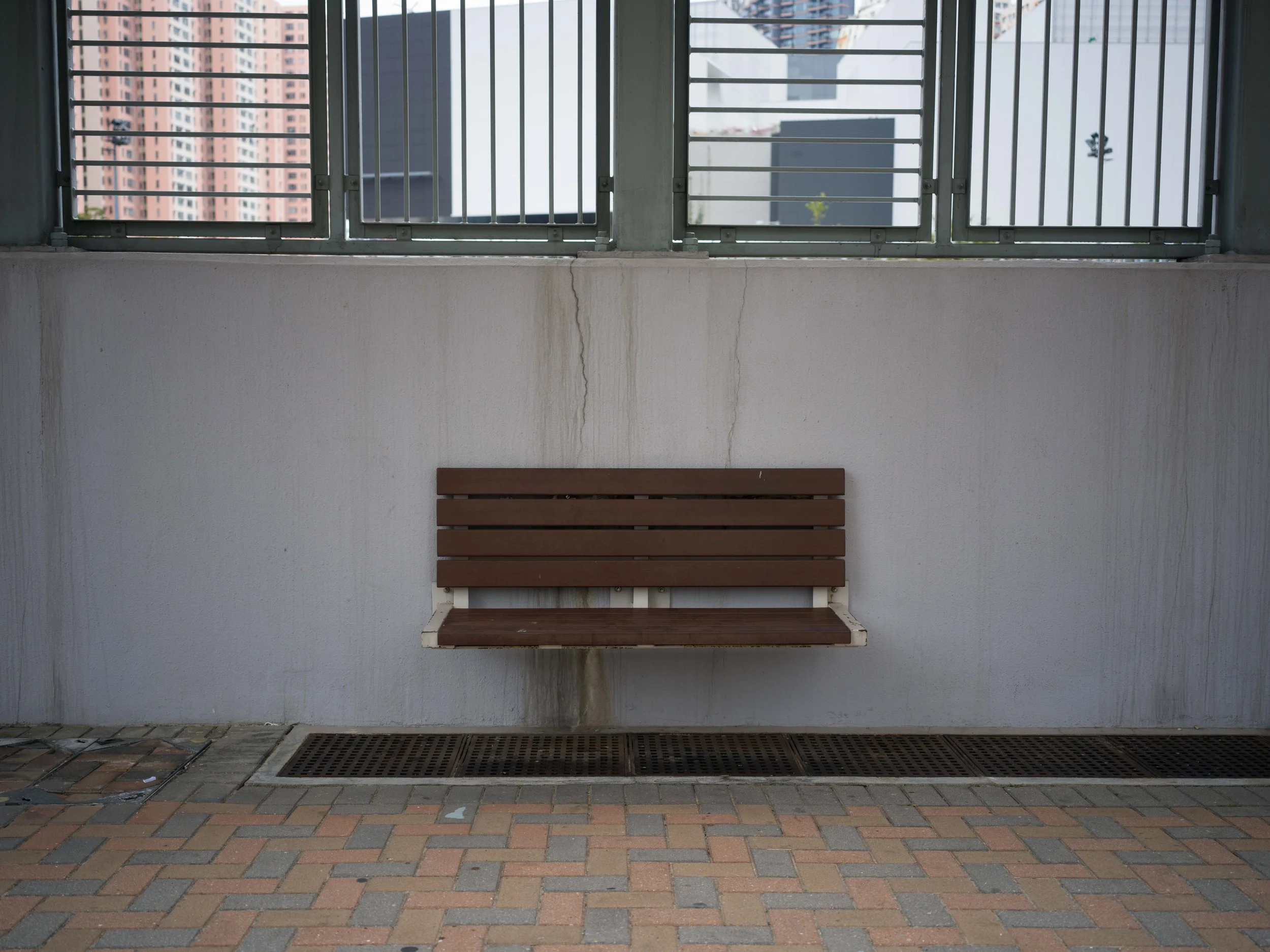 Purwanti used to chat with her sister Yasmiati on this bench in Ngau Tau Kok, eastern Hong Kong, on their days off every Sunday. 