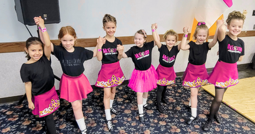 Group of McGovern Irish Dance dancers in pink